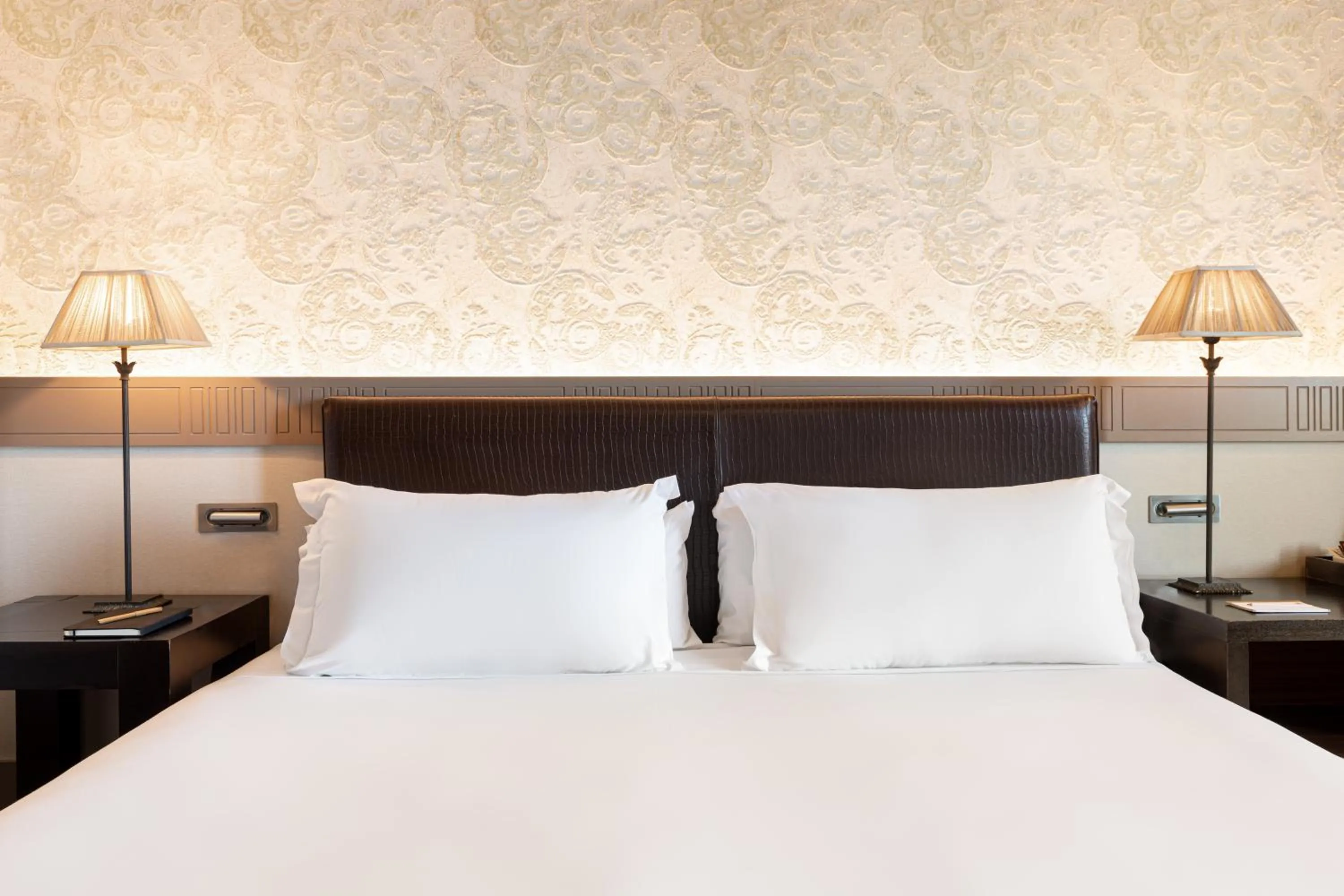 Bed in Duquesa de Cardona Hotel 4 Sup by Grup Duquessa