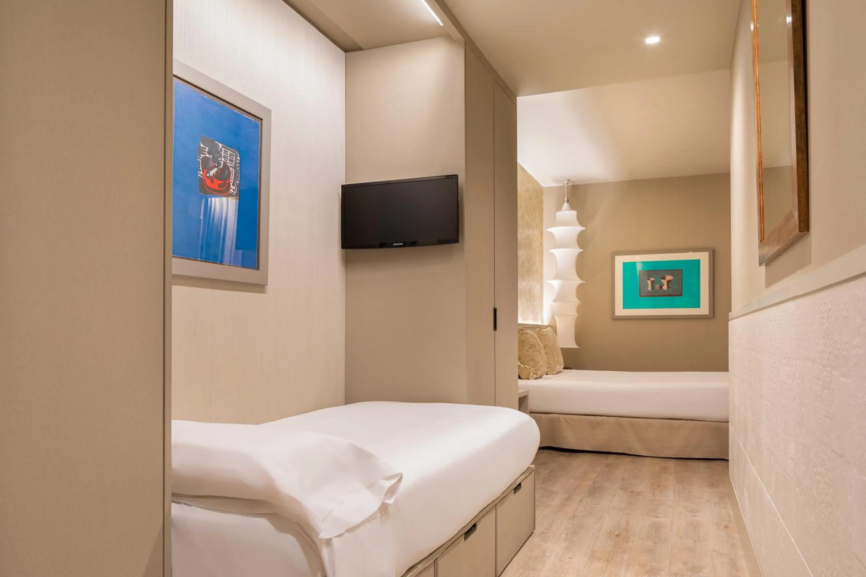 Bed in Duquesa de Cardona Hotel 4 Sup by Grup Duquessa