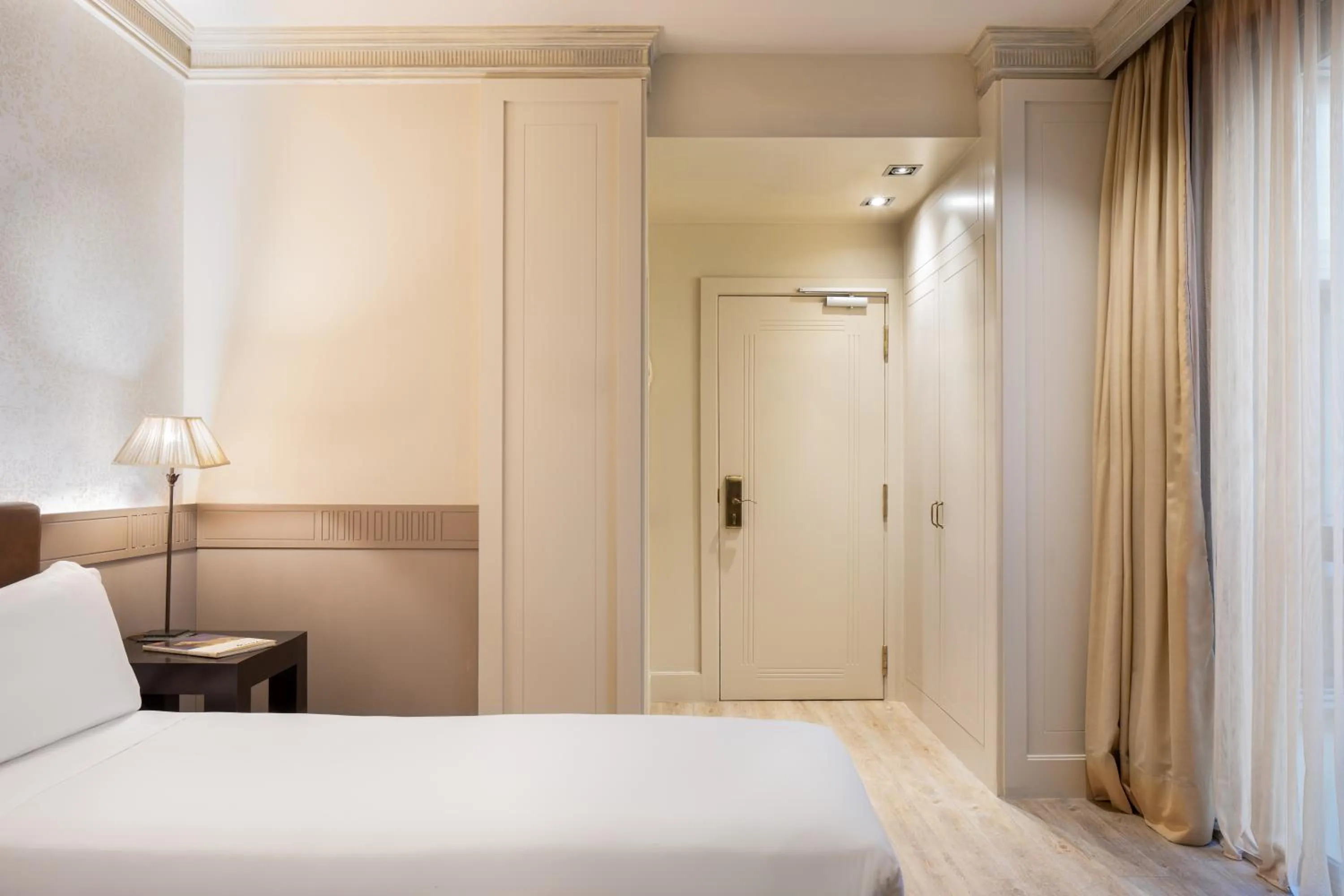 Bed in Duquesa de Cardona Hotel 4 Sup by Grup Duquessa