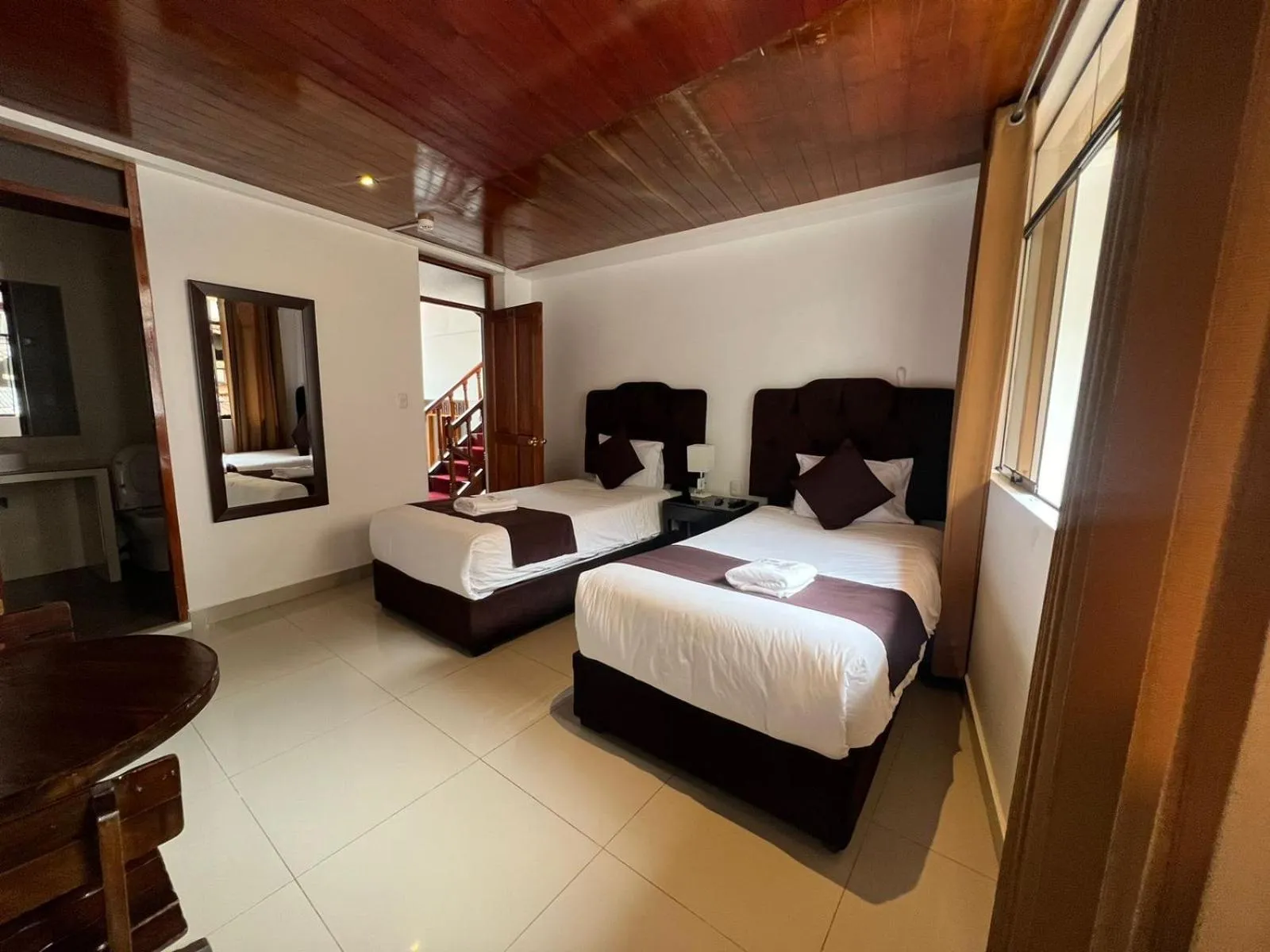 Bed in SAYACMARCA CLASSIC Inn