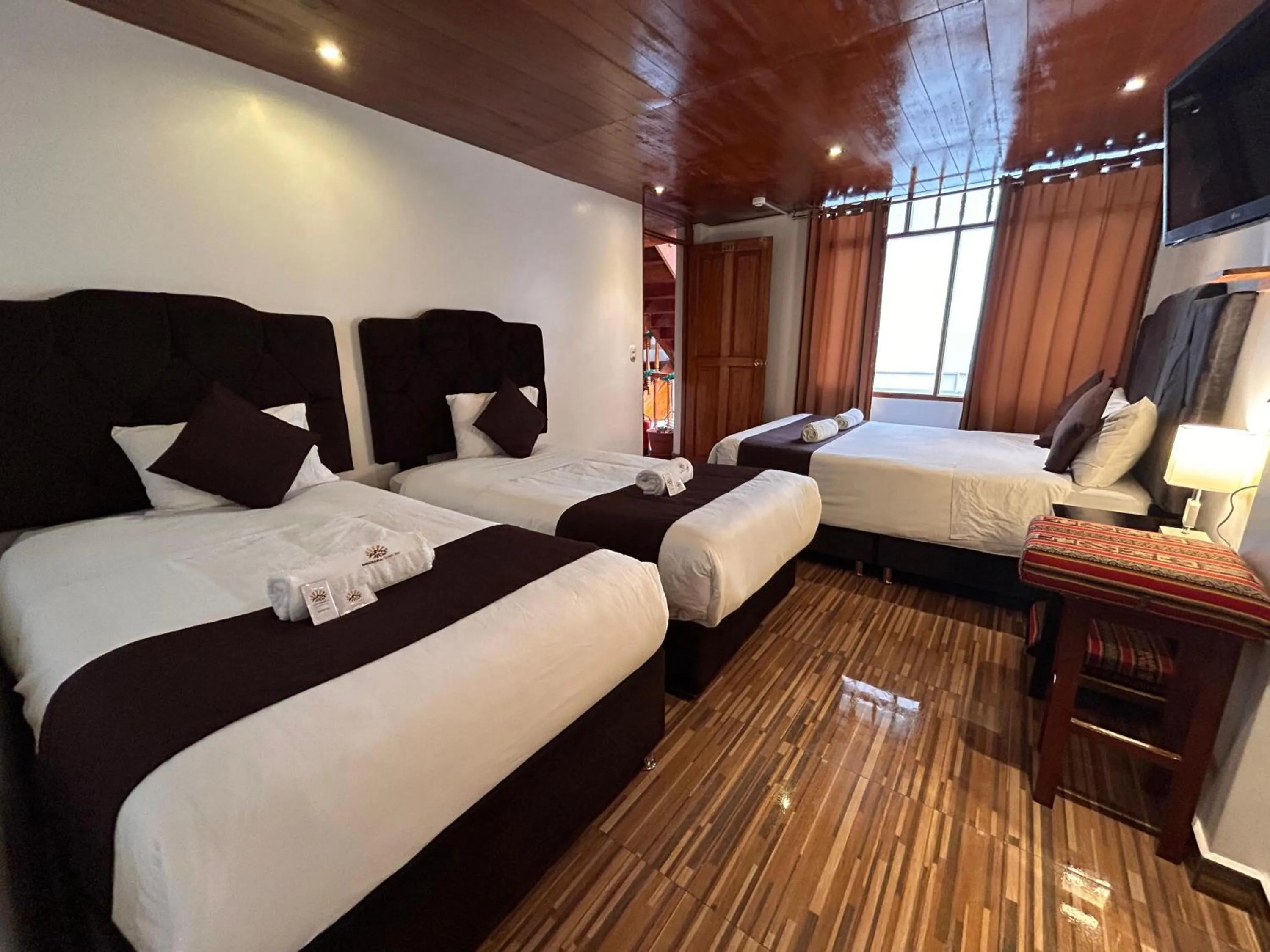 Bed in SAYACMARCA CLASSIC Inn