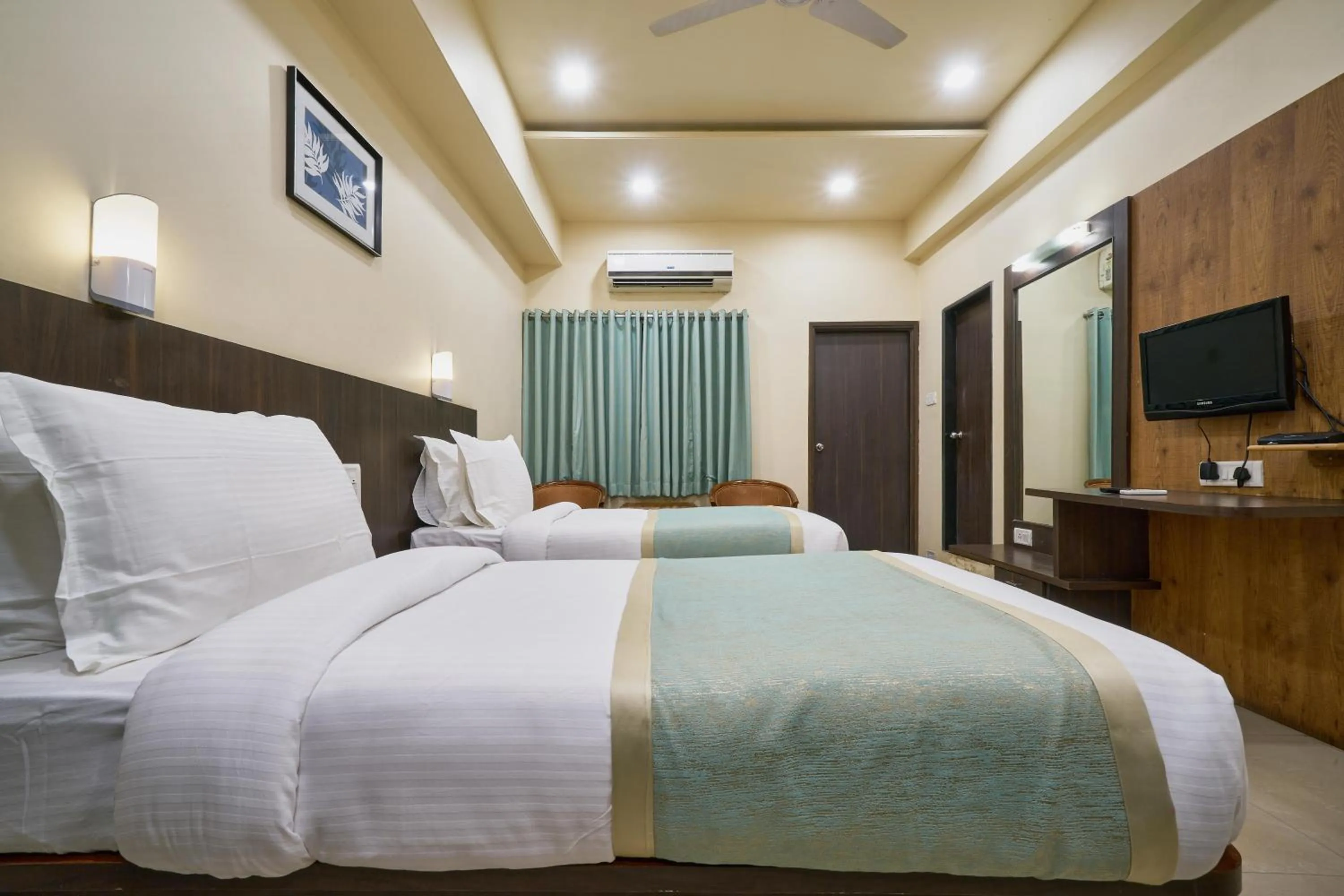 Bed in Hotel Atria, Kolhapur