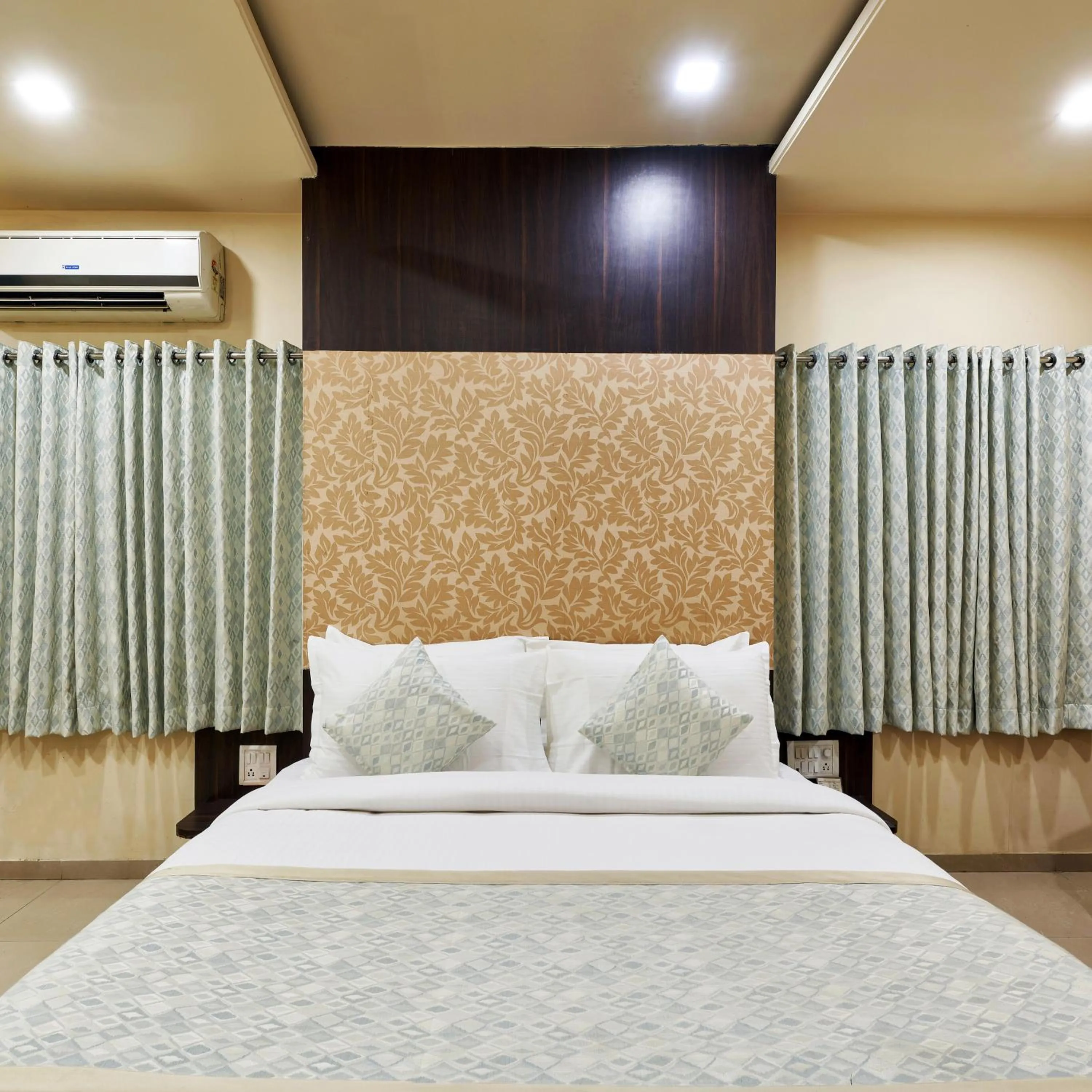 Photo of the whole room, Bed in Hotel Atria, Kolhapur