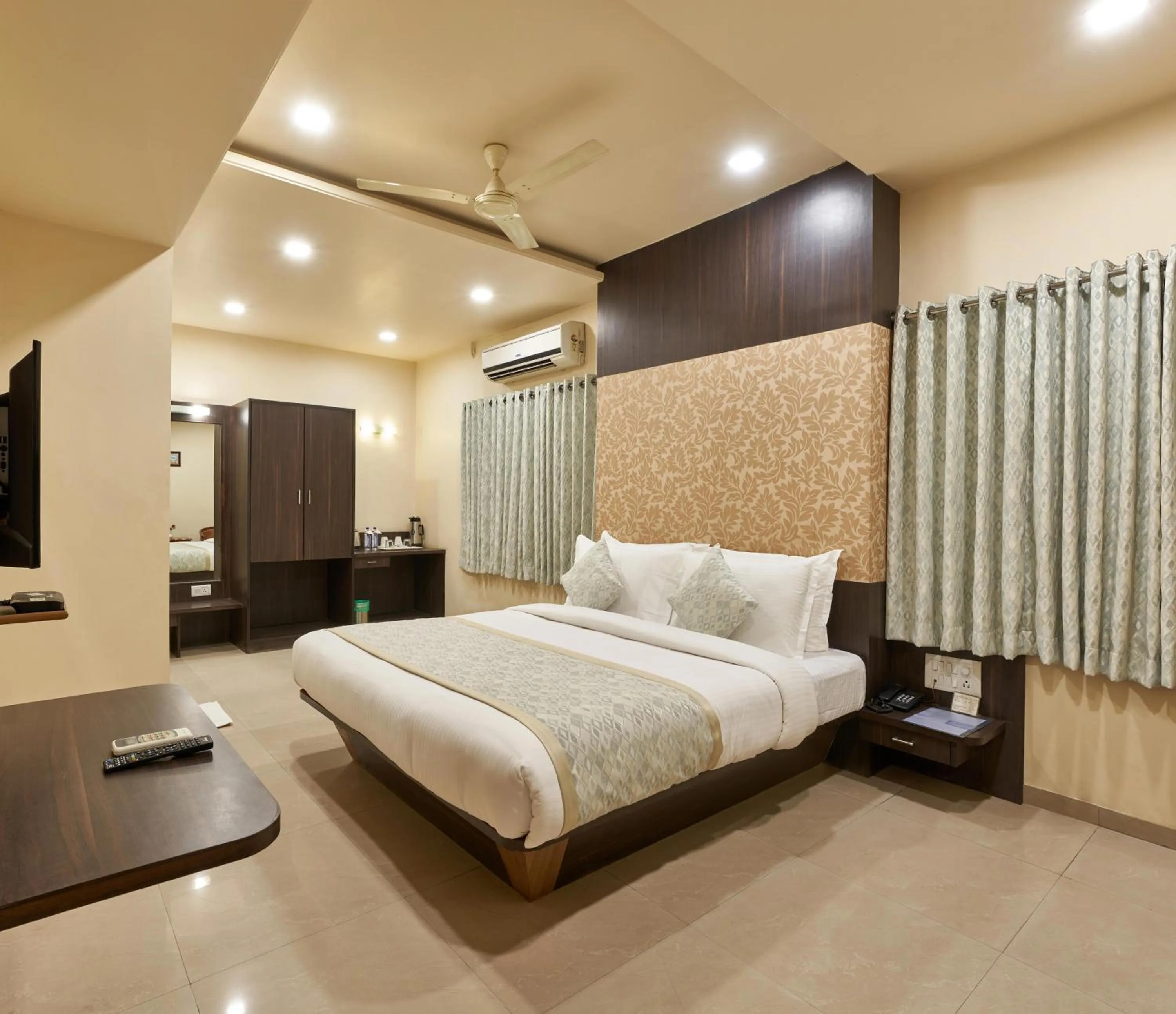 Photo of the whole room, Bed in Hotel Atria, Kolhapur
