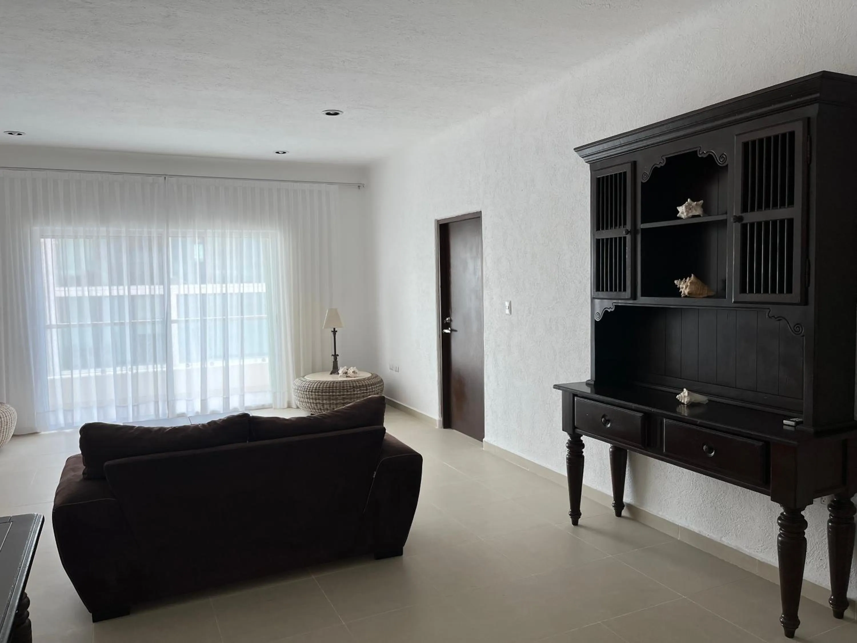 Living room in Thelmar Playa Mamitas Apartment