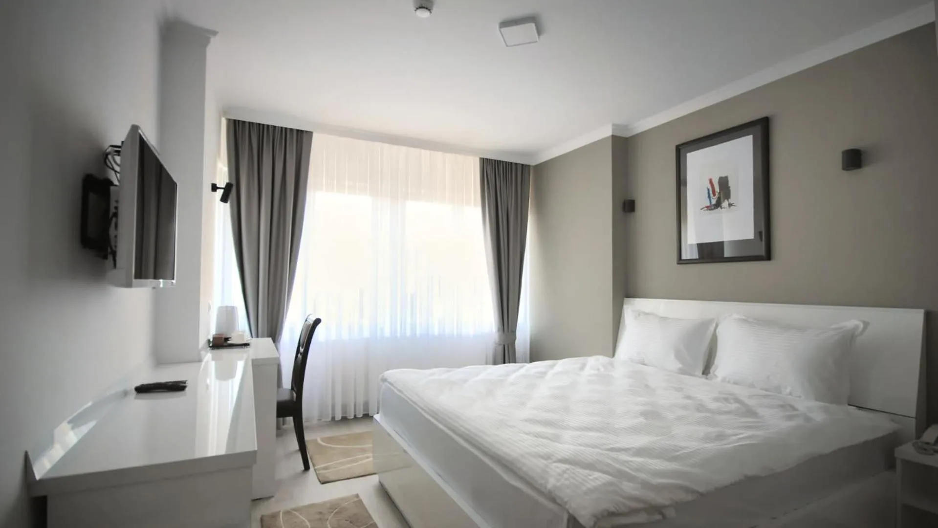 Bed in Hotel Callisto