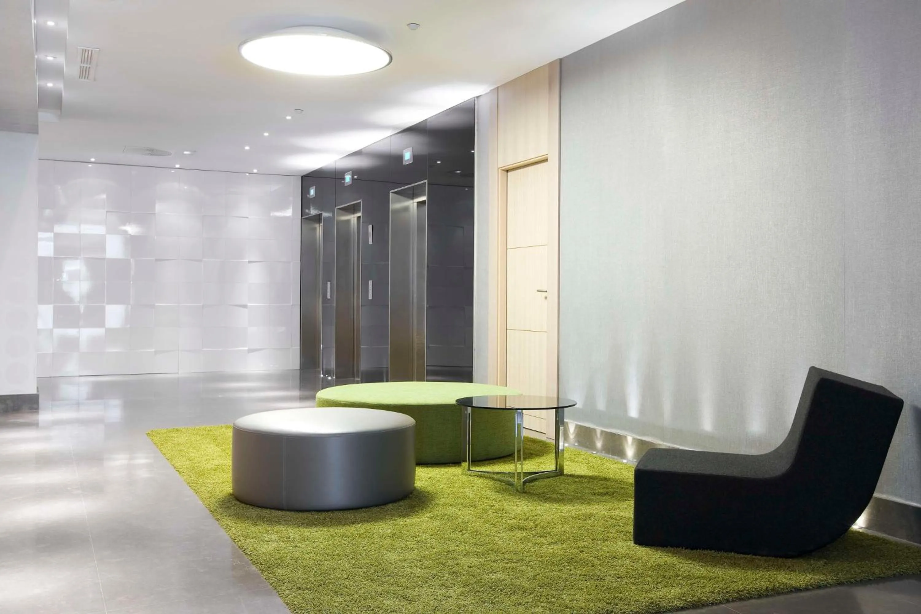 Lobby or reception in NH Madrid Principe de Vergara