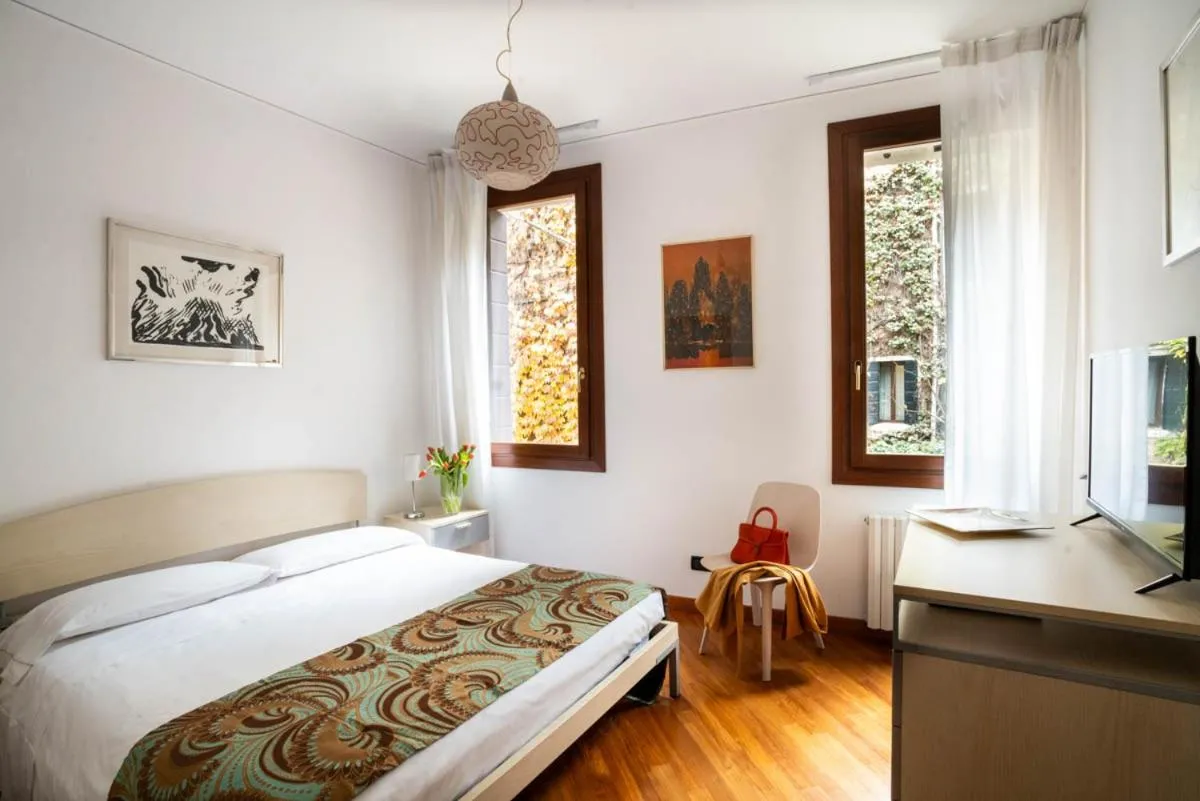 Bed in Salmaso Apartments