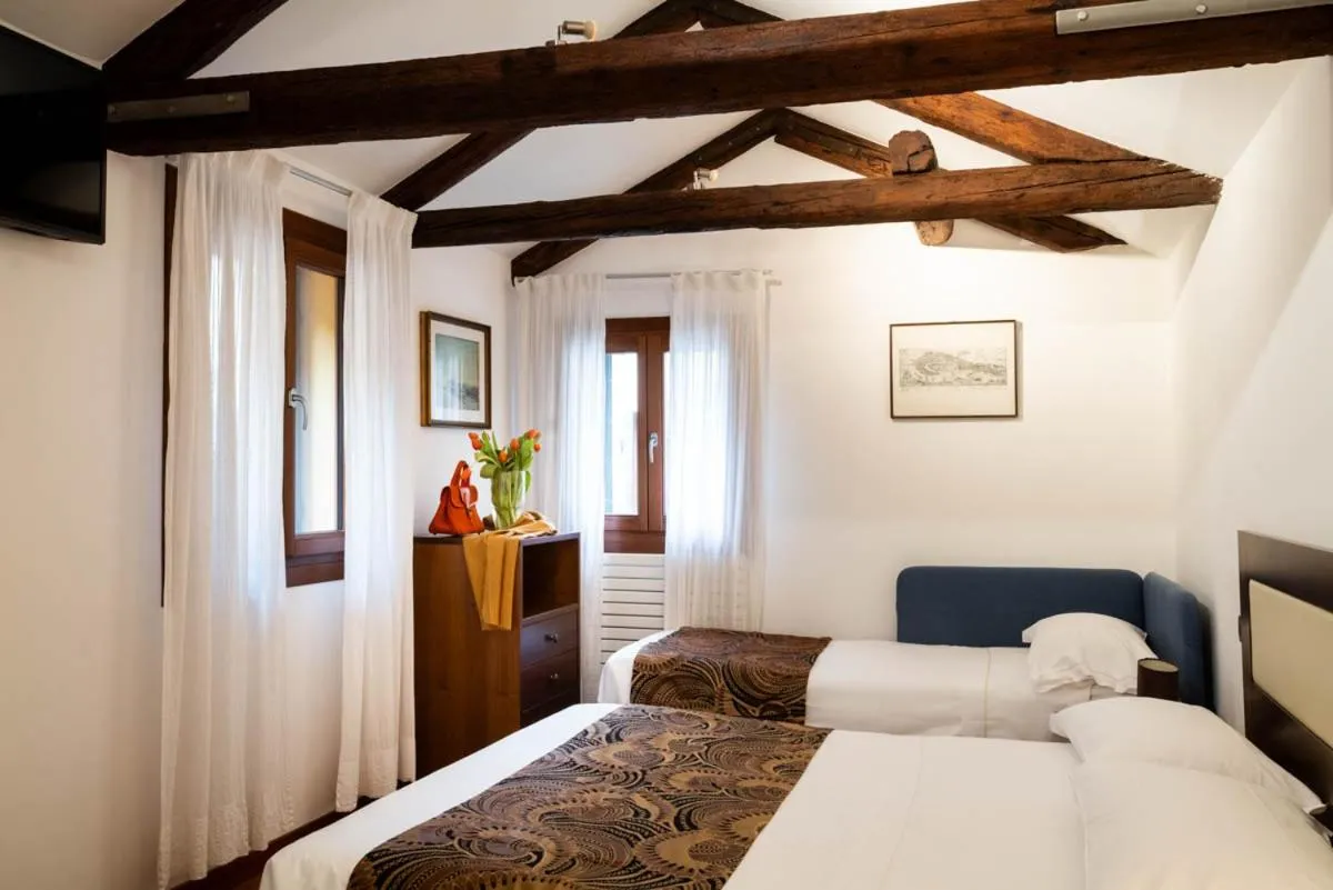 Bed in Salmaso Apartments