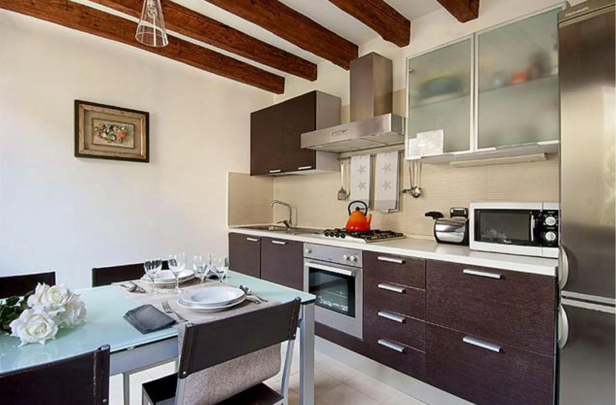 Kitchen or kitchenette in Salmaso Apartments