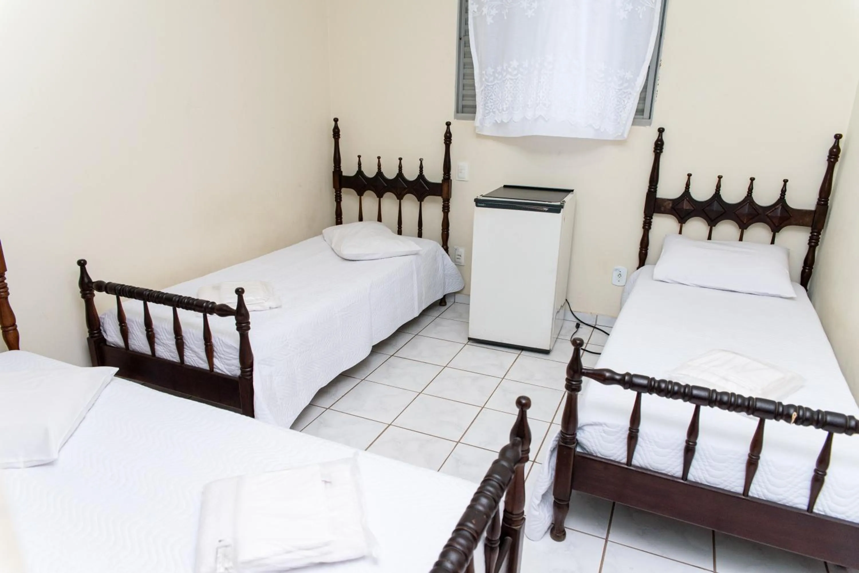 Bed in Hotel Descalvado