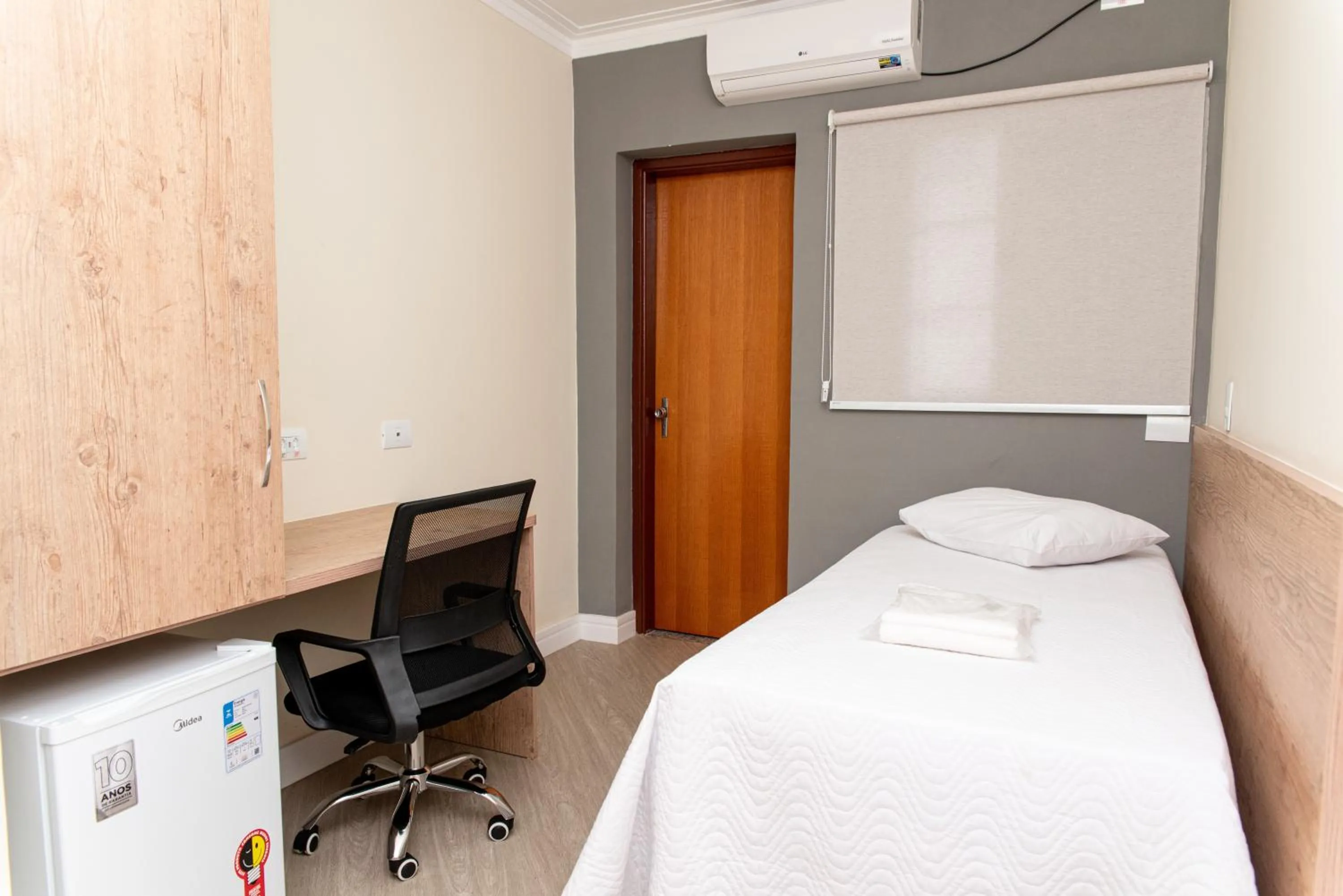 Bed in Hotel Descalvado