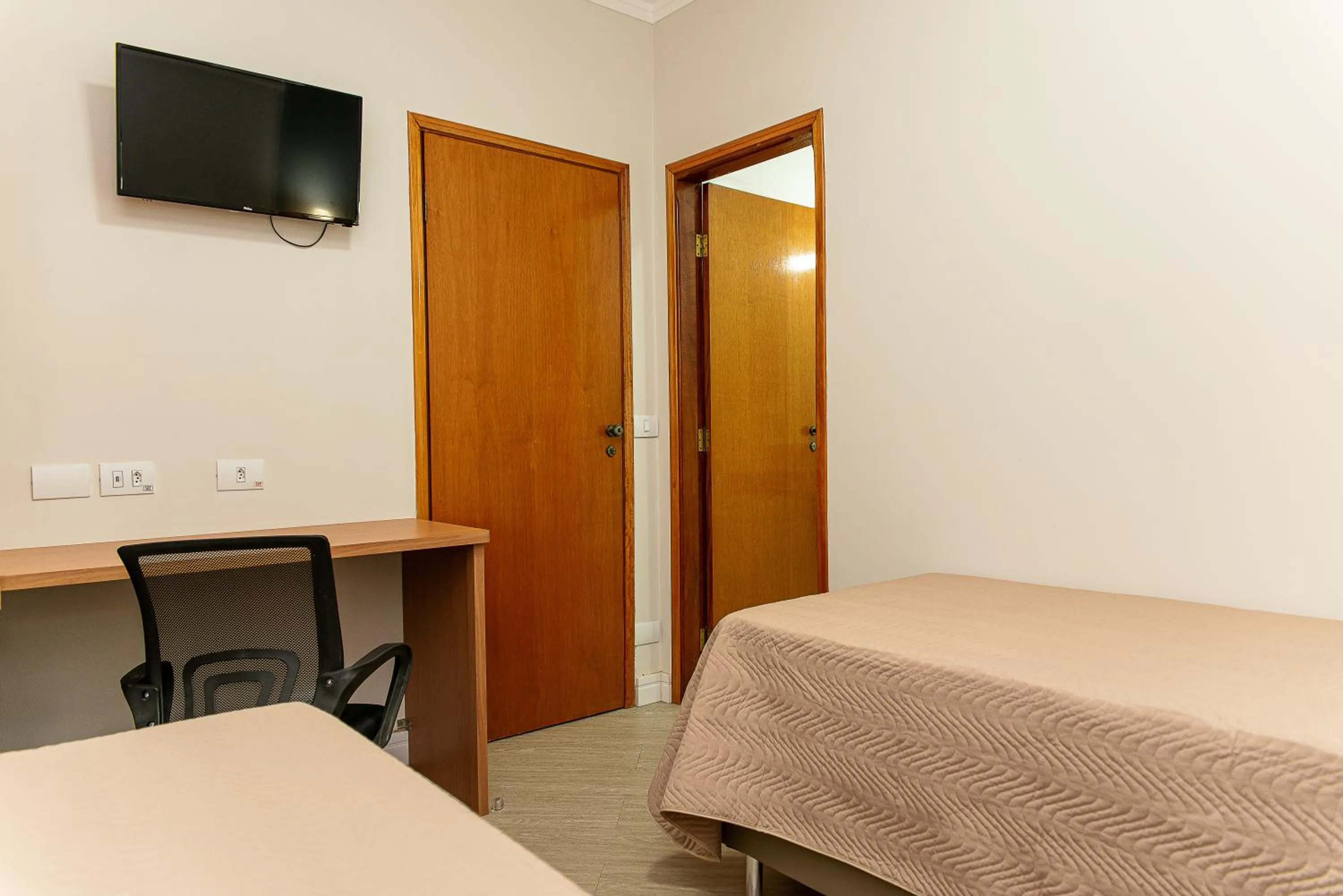 Bed in Hotel Descalvado