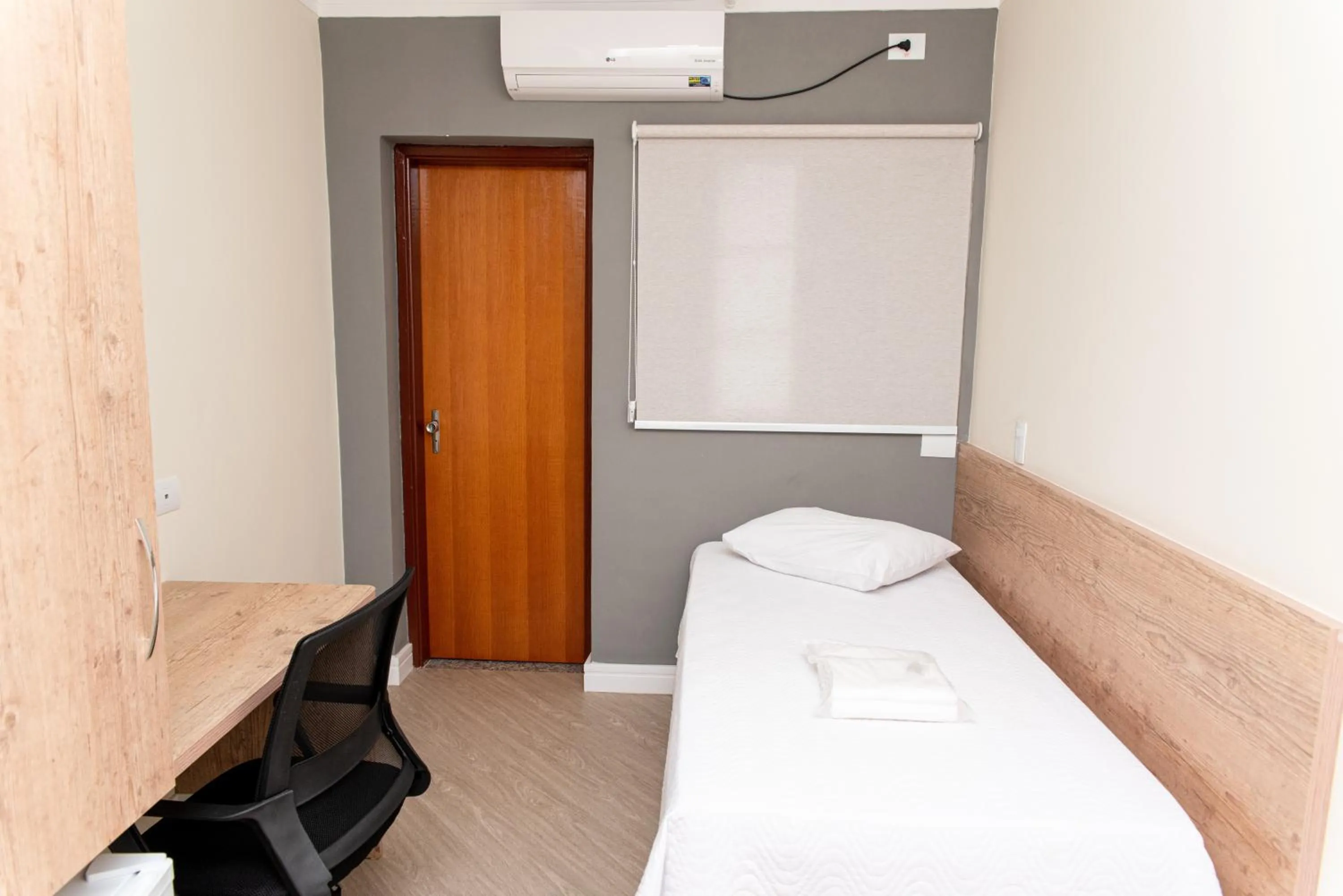 Bed in Hotel Descalvado