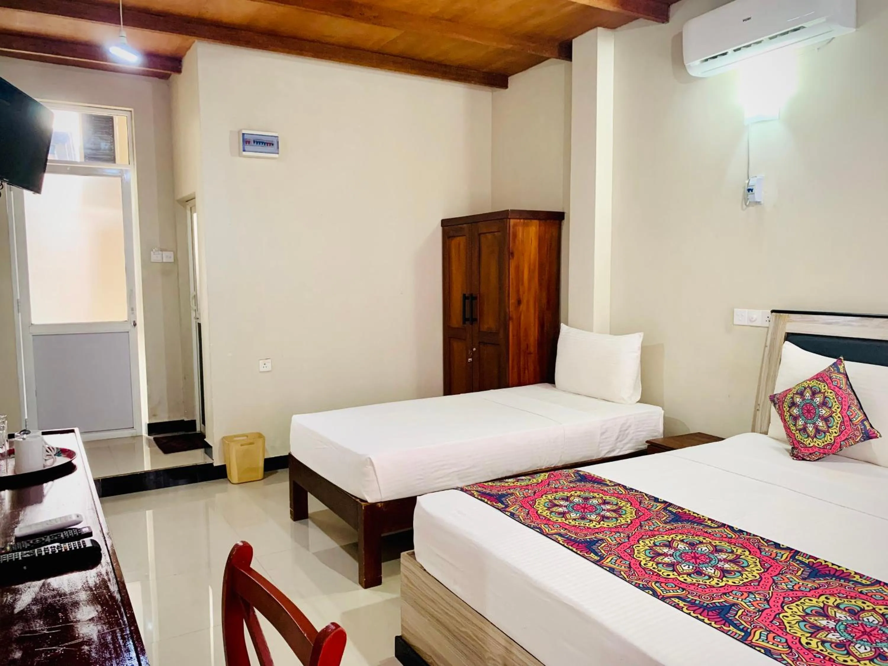 Bed in Elepath Lodge Pinnawala