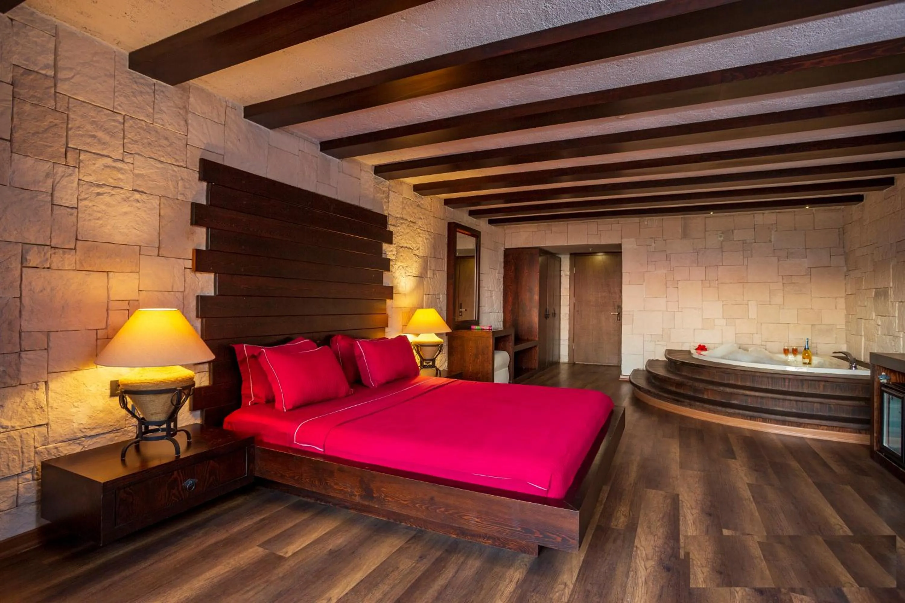 Bed in Manaspark Deluxe Hotel