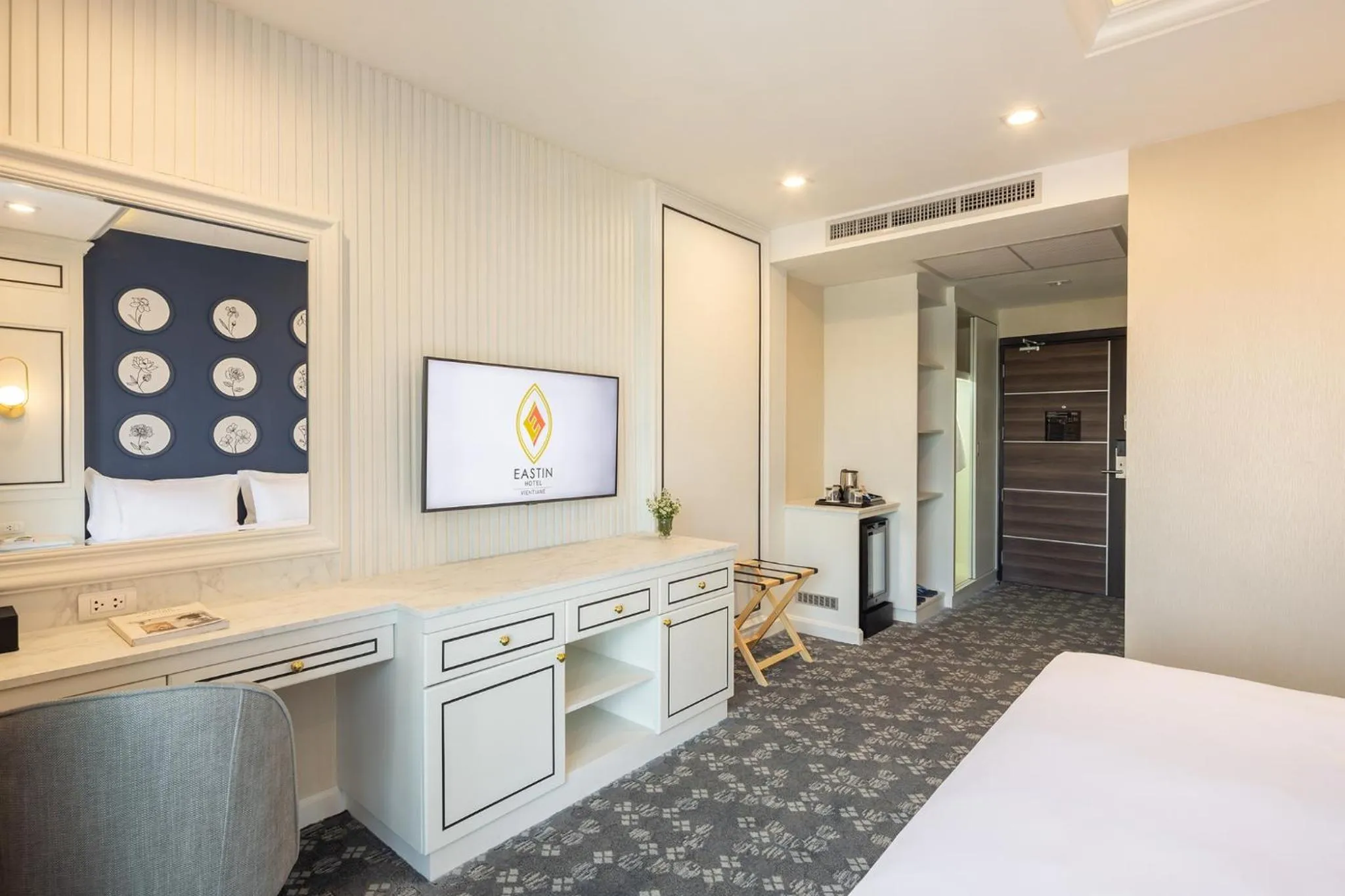 Photo of the whole room, Bed in Eastin Hotel Vientiane