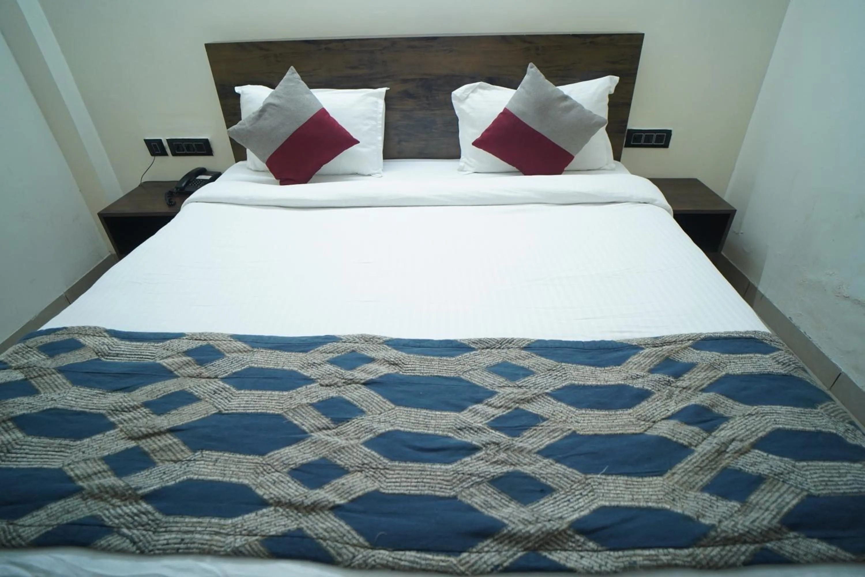 Bed in White House Country Inn By PEARL Luxury Hotel In Jhajjar