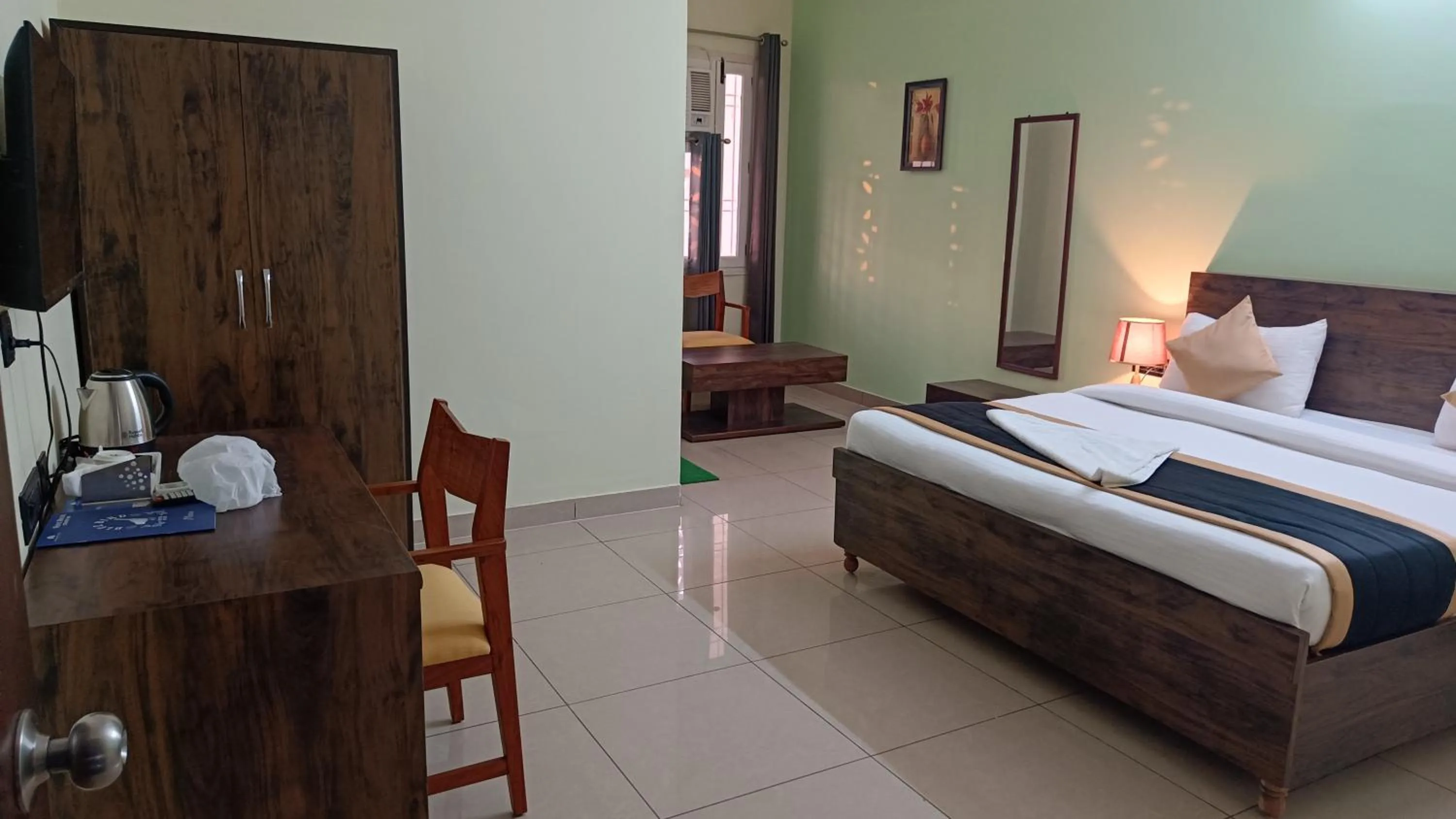 Photo of the whole room in White House Country Inn By PEARL Luxury Hotel In Jhajjar