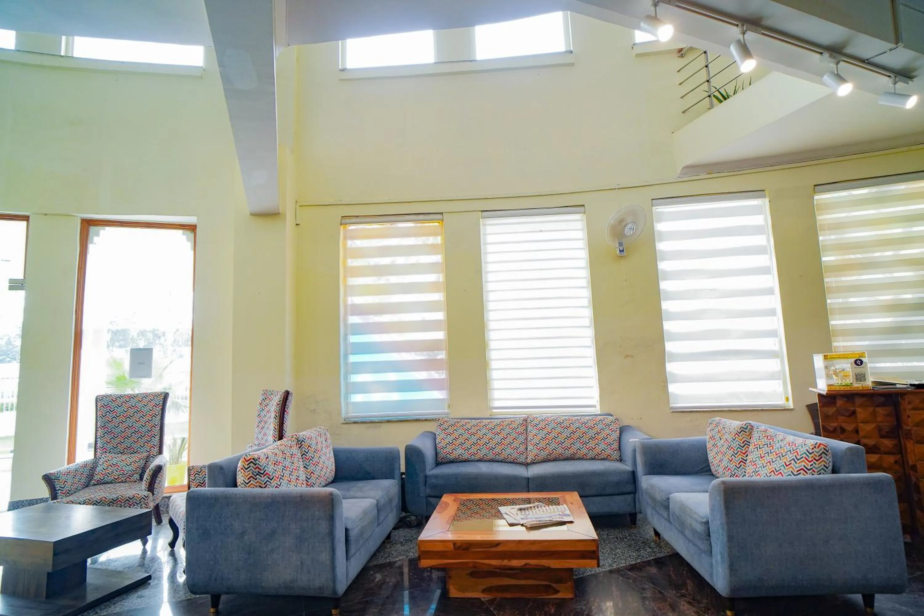 Seating area in White House Country Inn By PEARL Luxury Hotel In Jhajjar