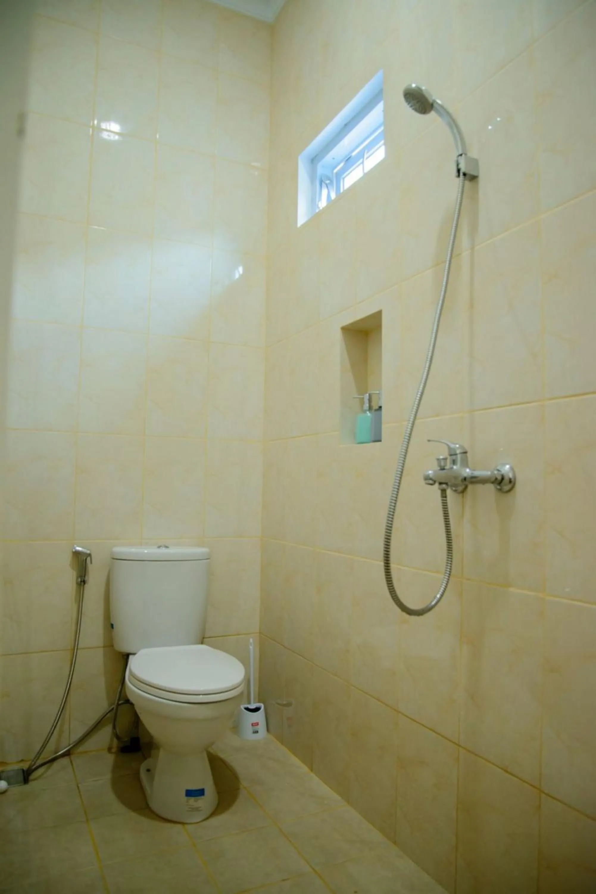 Bathroom in RedDoorz syariah near Universitas Islam Riau
