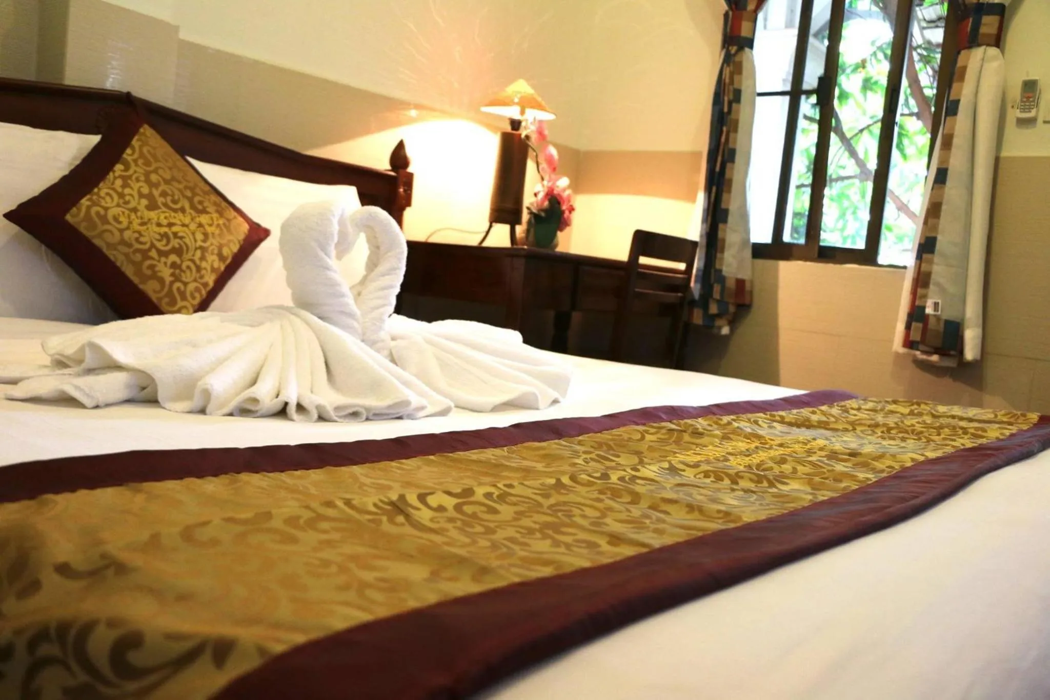 Bed in Mali Namphu Hotel