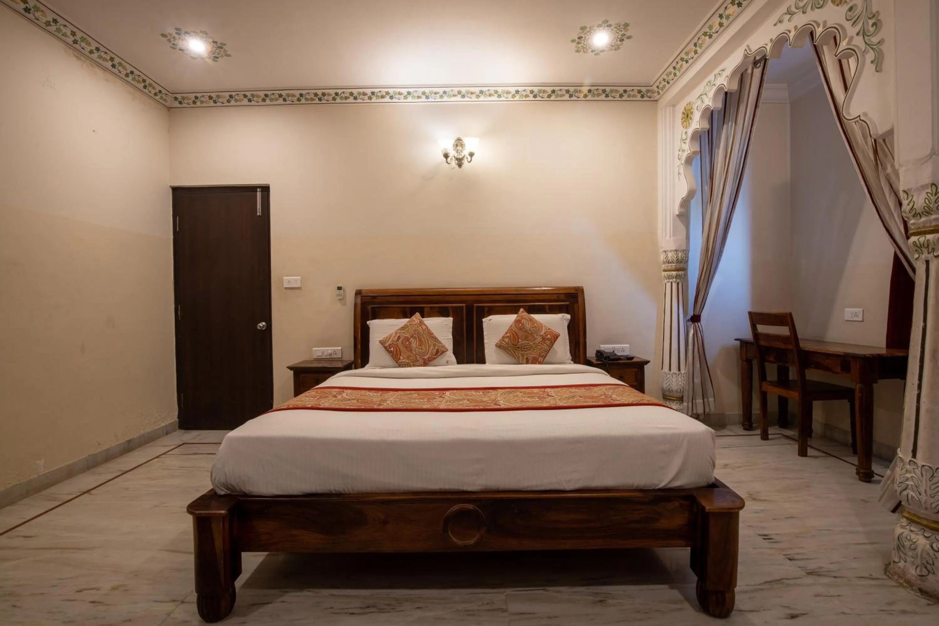 Bed in Hotel Royal Pratap Niwas