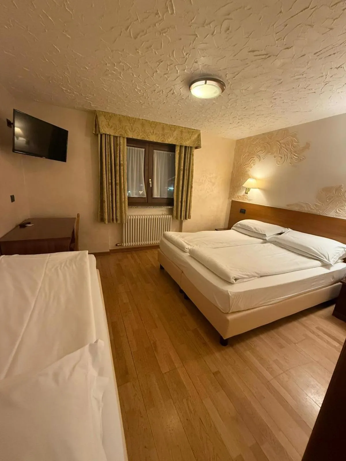 Bed in Hotel Breuil