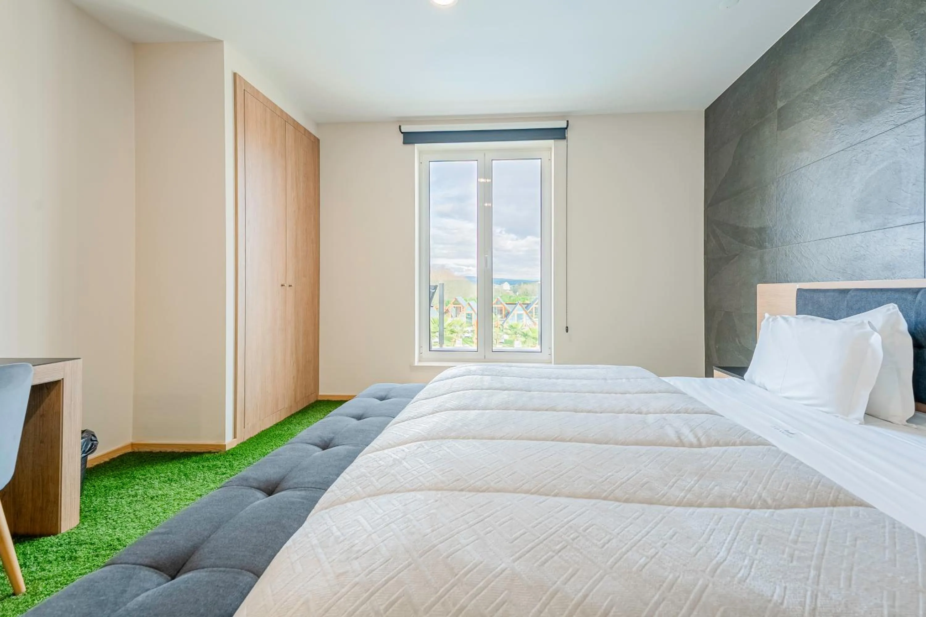 Bed in Lena Village Hotel and Spa