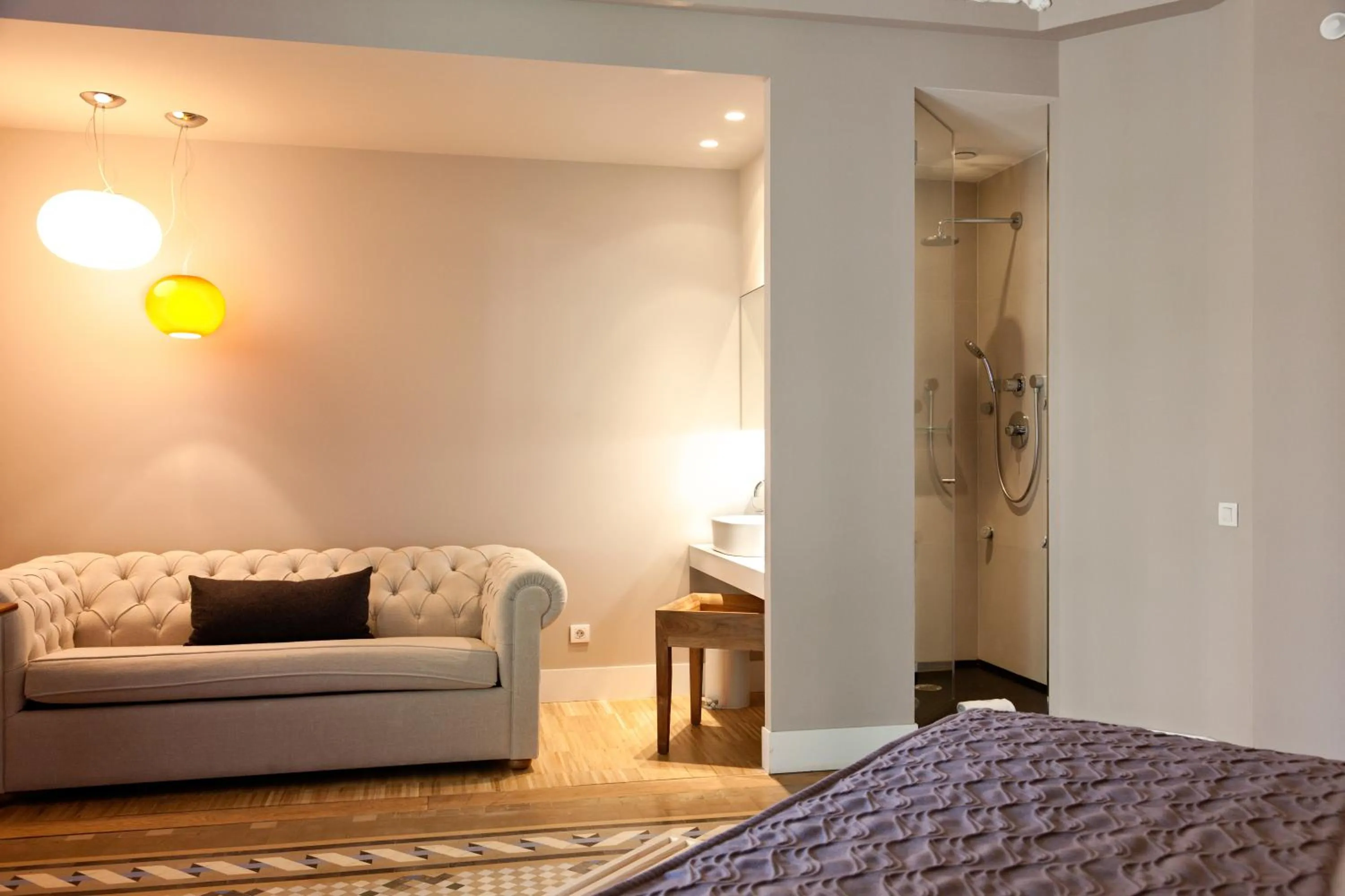 Living room, Bed in Alexandra Barcelona Hotel, Curio Collection by Hilton