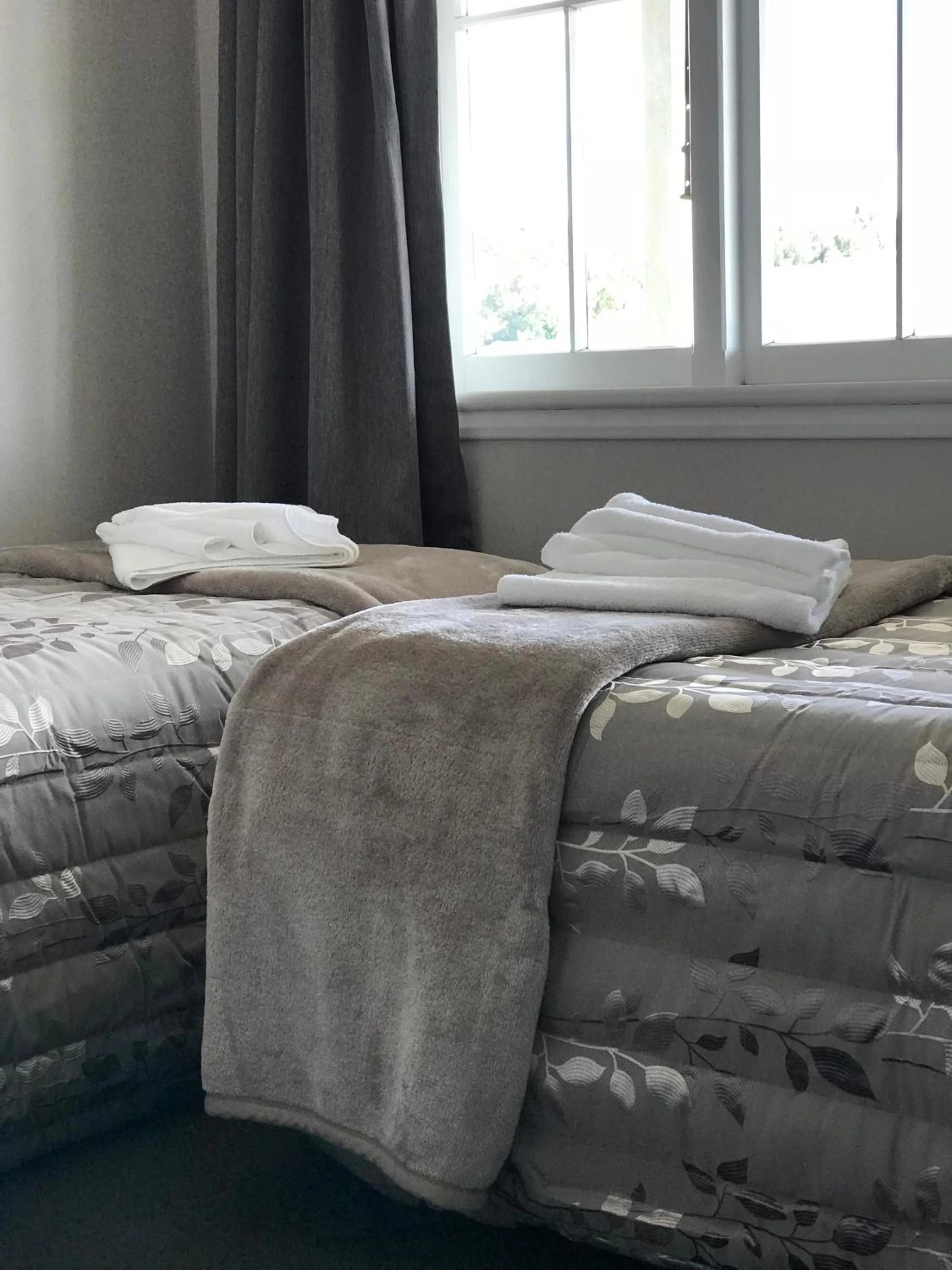 Bed in Lantern Court Motel