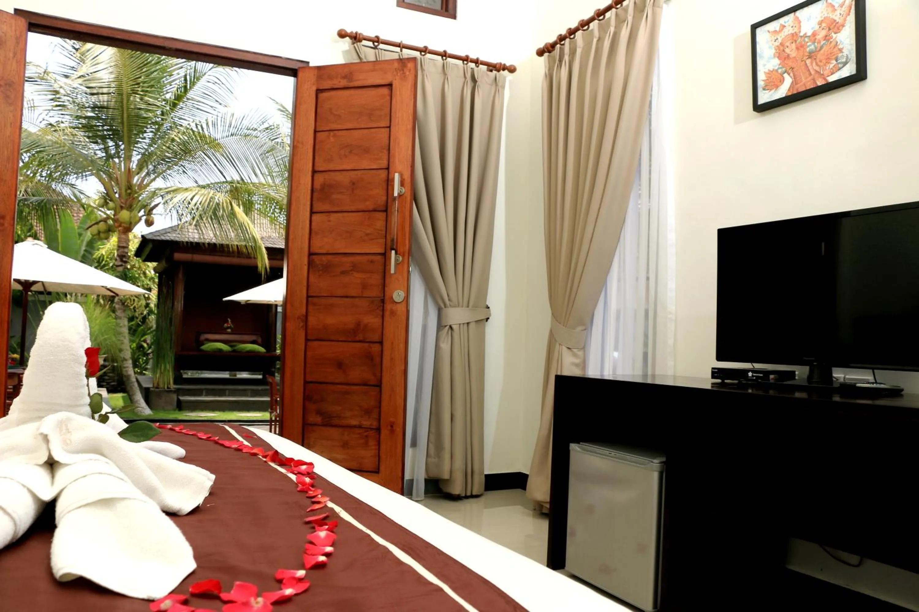 Communal lounge/ TV room in Kubu Garden Suites & Villas Nusa Dua