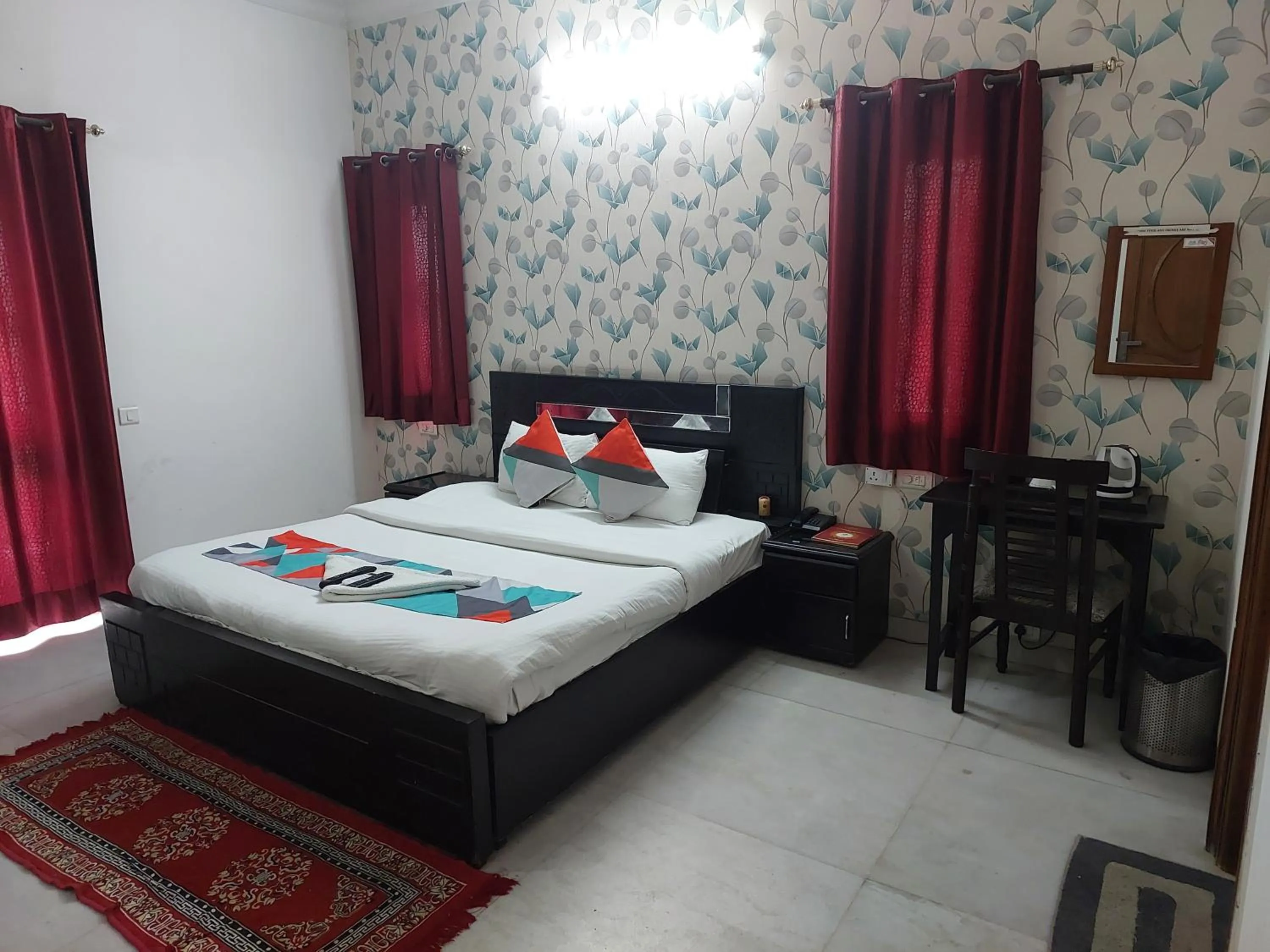 Bed in Hotel Ashray Noida