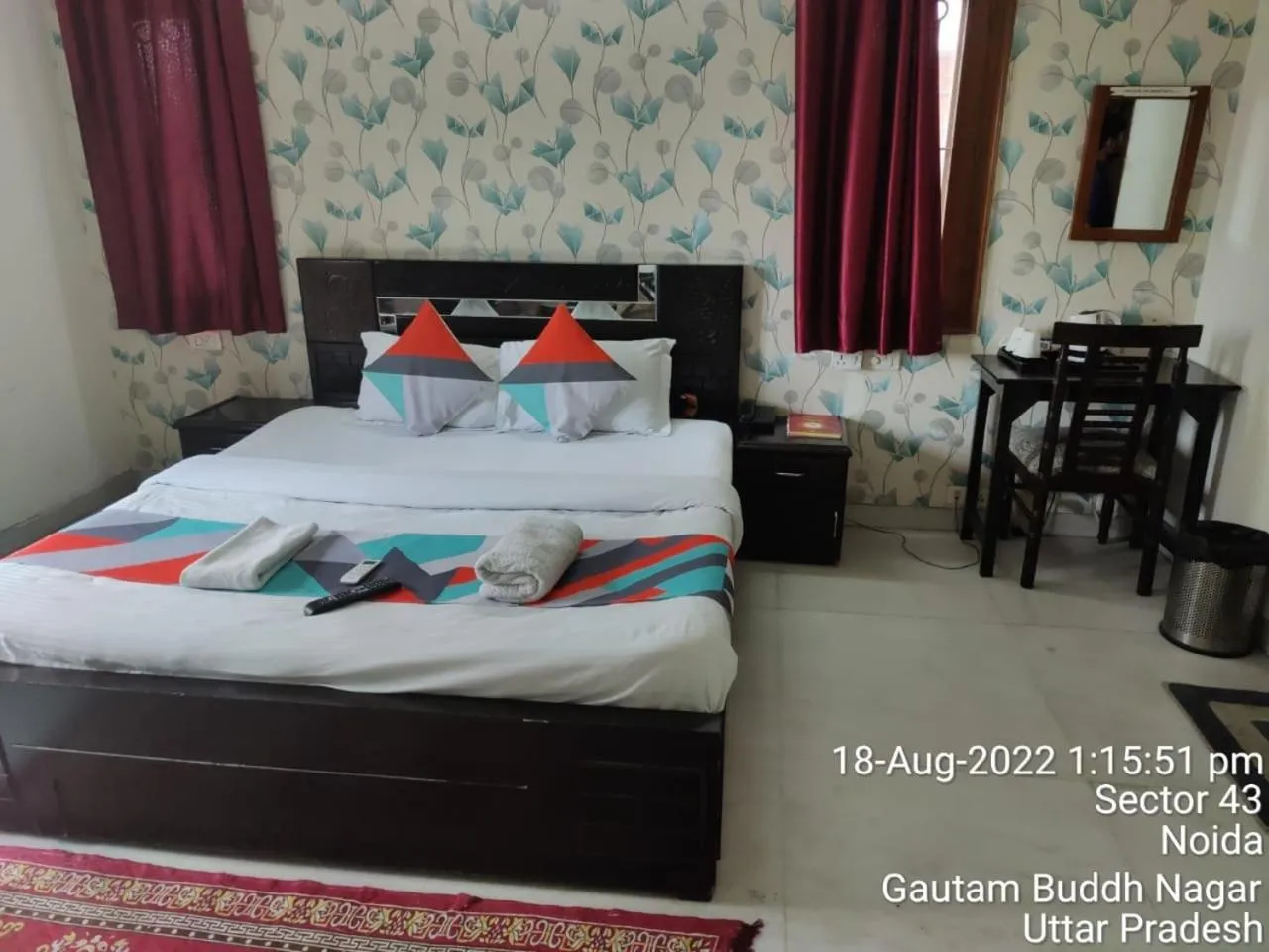 Bed in Hotel Ashray Noida
