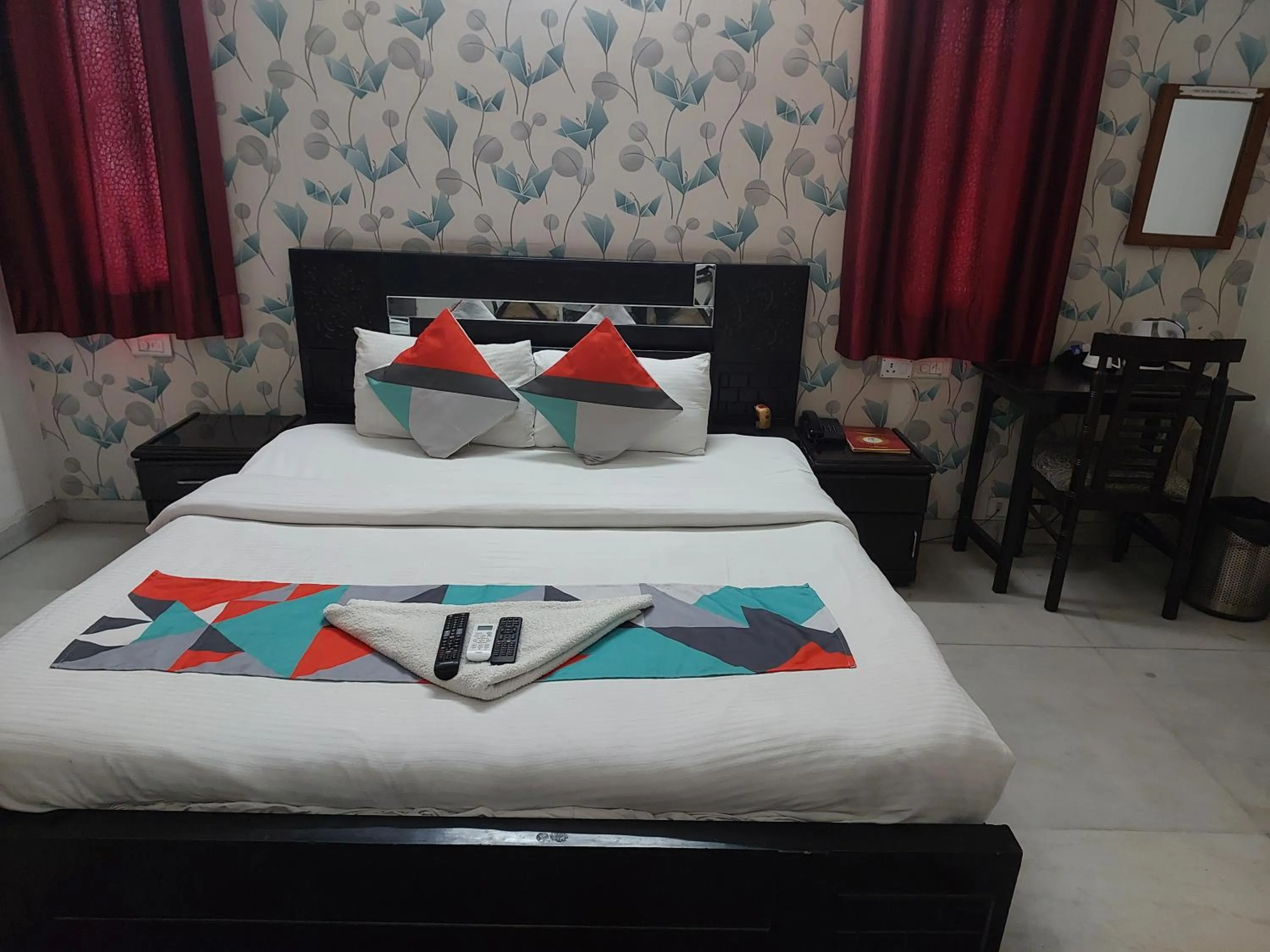 Bed in Hotel Ashray Noida