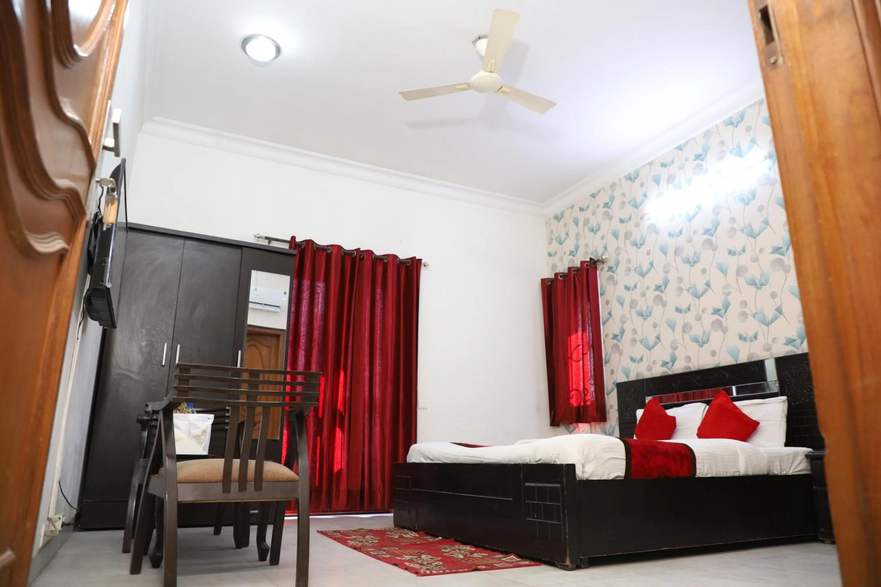 Bed in Hotel Ashray Noida