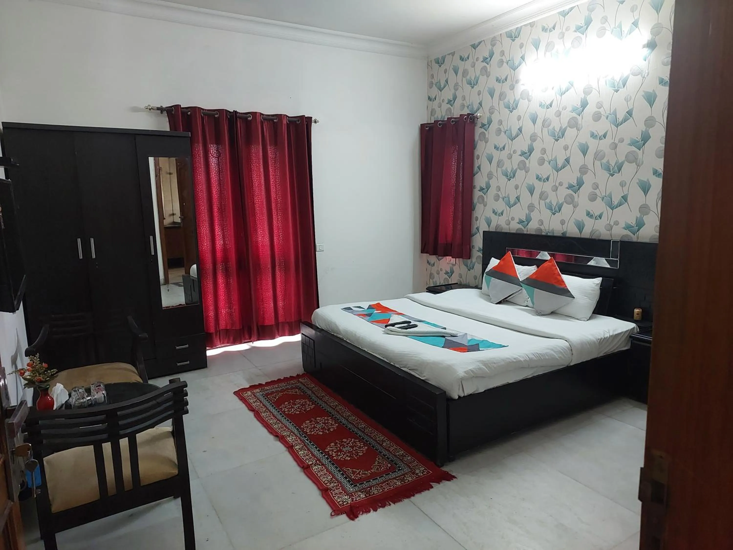 Bed in Hotel Ashray Noida