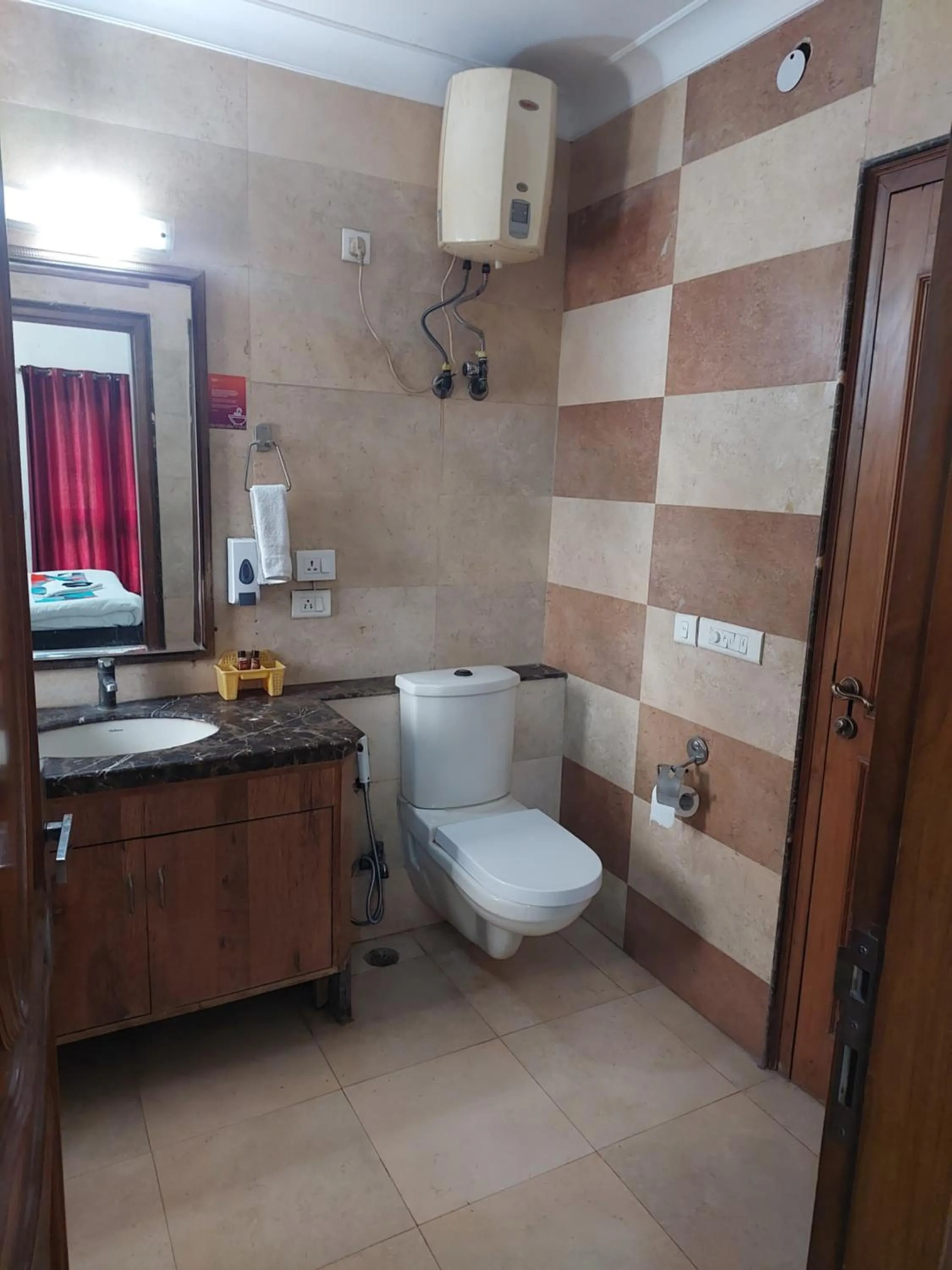 Toilet in Hotel Ashray Noida
