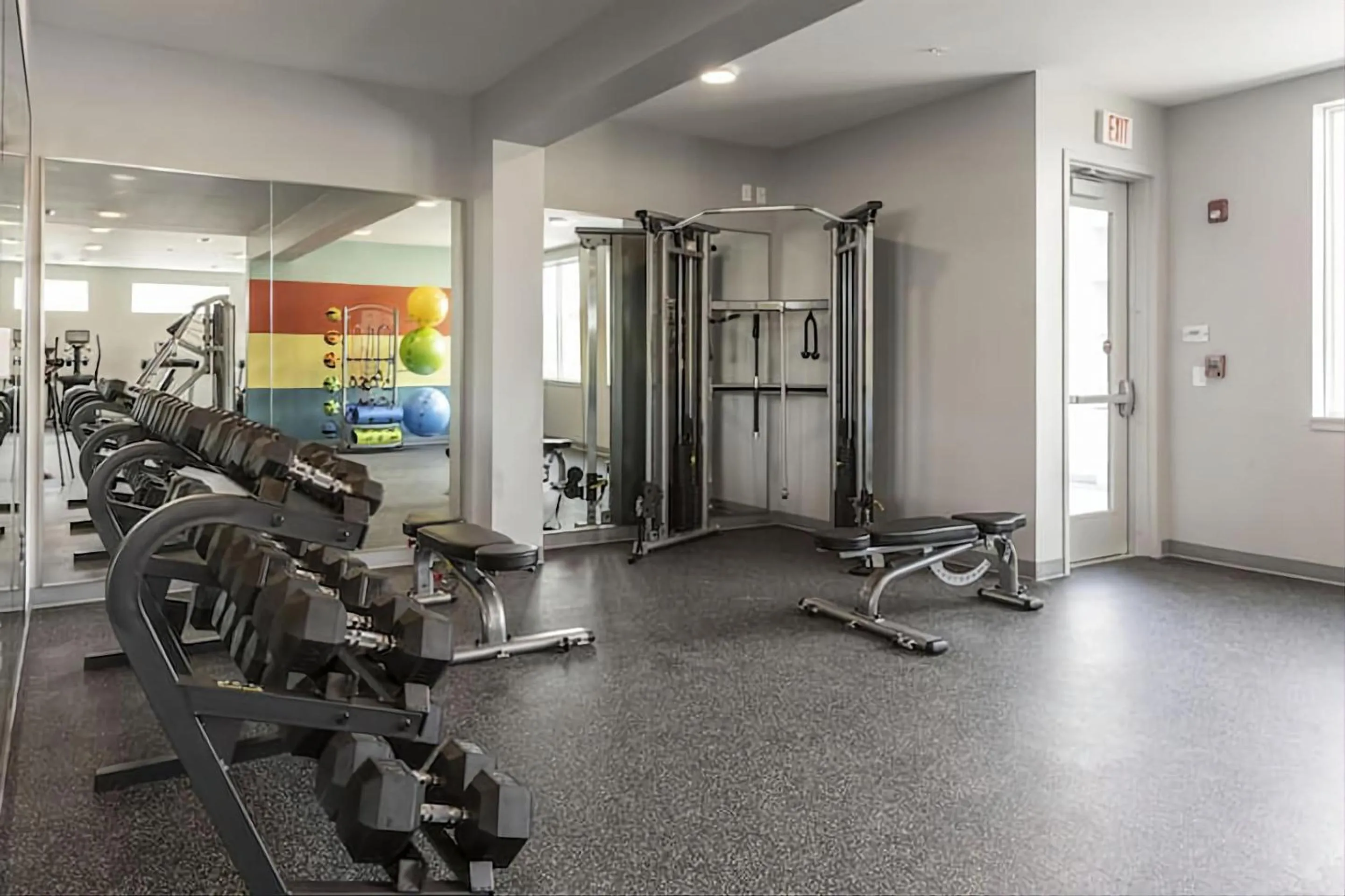 Fitness centre/facilities in Contemporary 1 BDRM Apt with Pool Parking Gym
