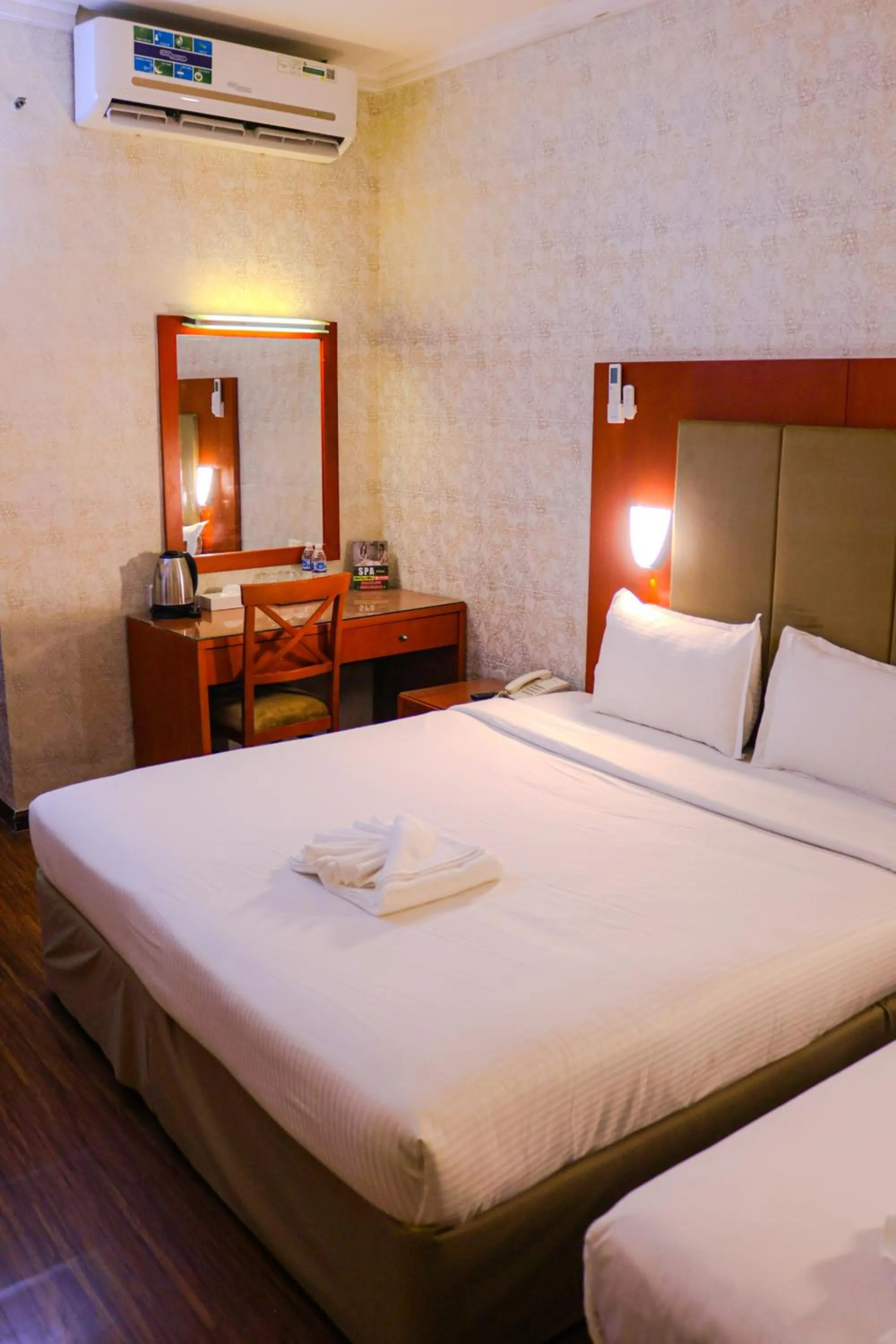 Photo of the whole room, Bed in BOONMAX Hotel