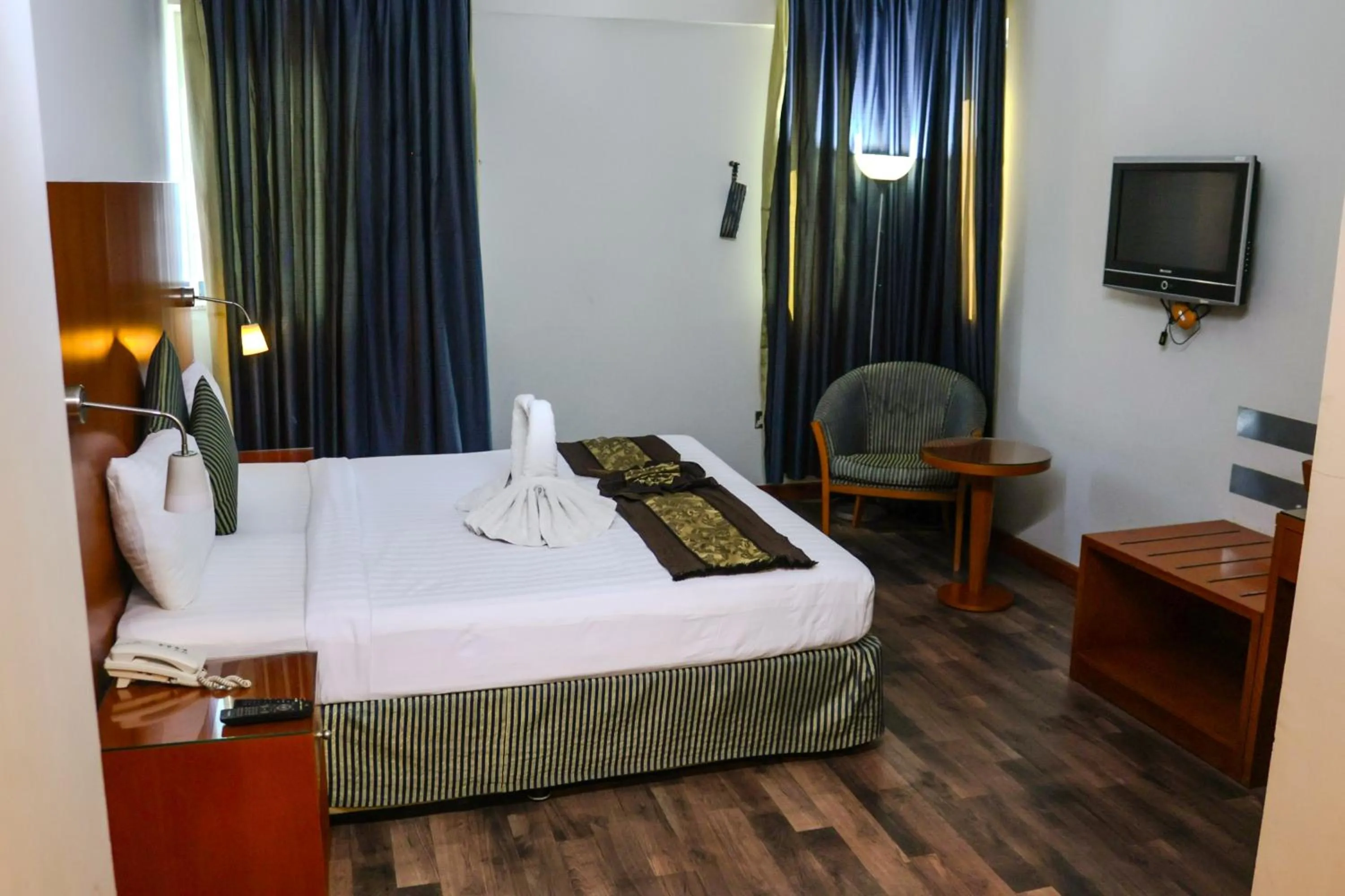 Photo of the whole room, Bed in BOONMAX Hotel