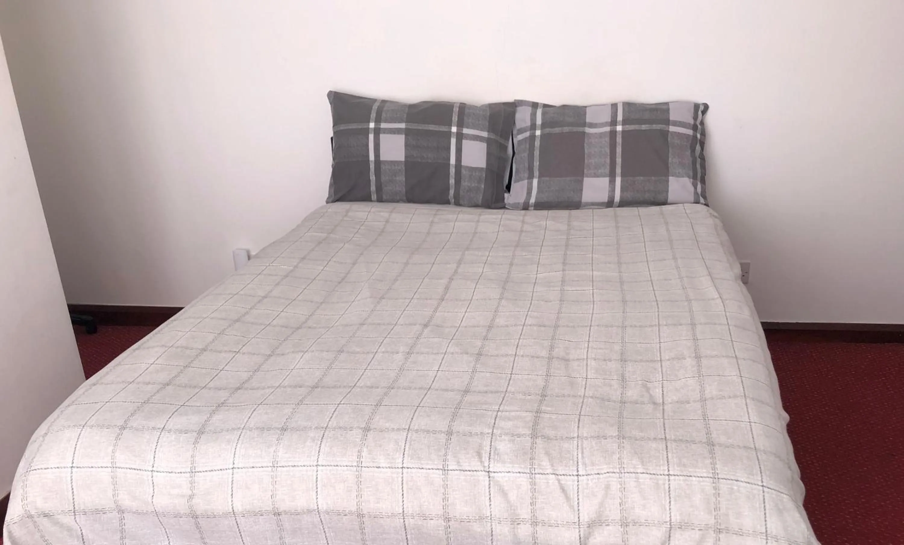 Bed in Lyttleton Guest House Limited