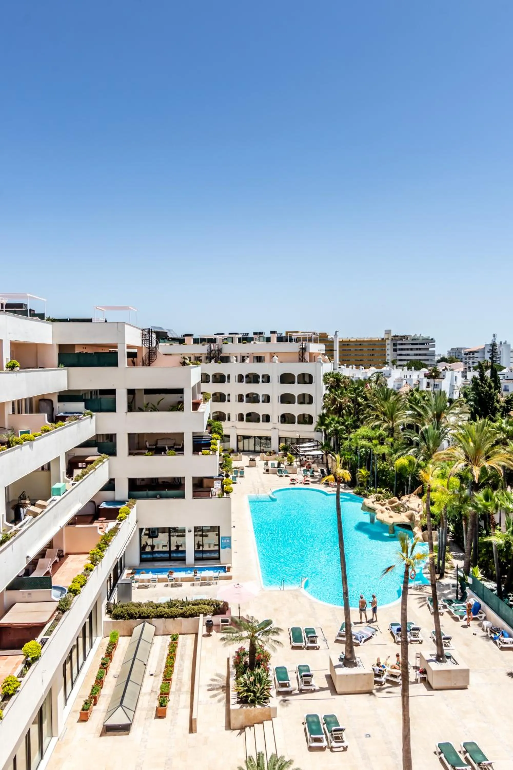 Pool view in Guadalpin Suites