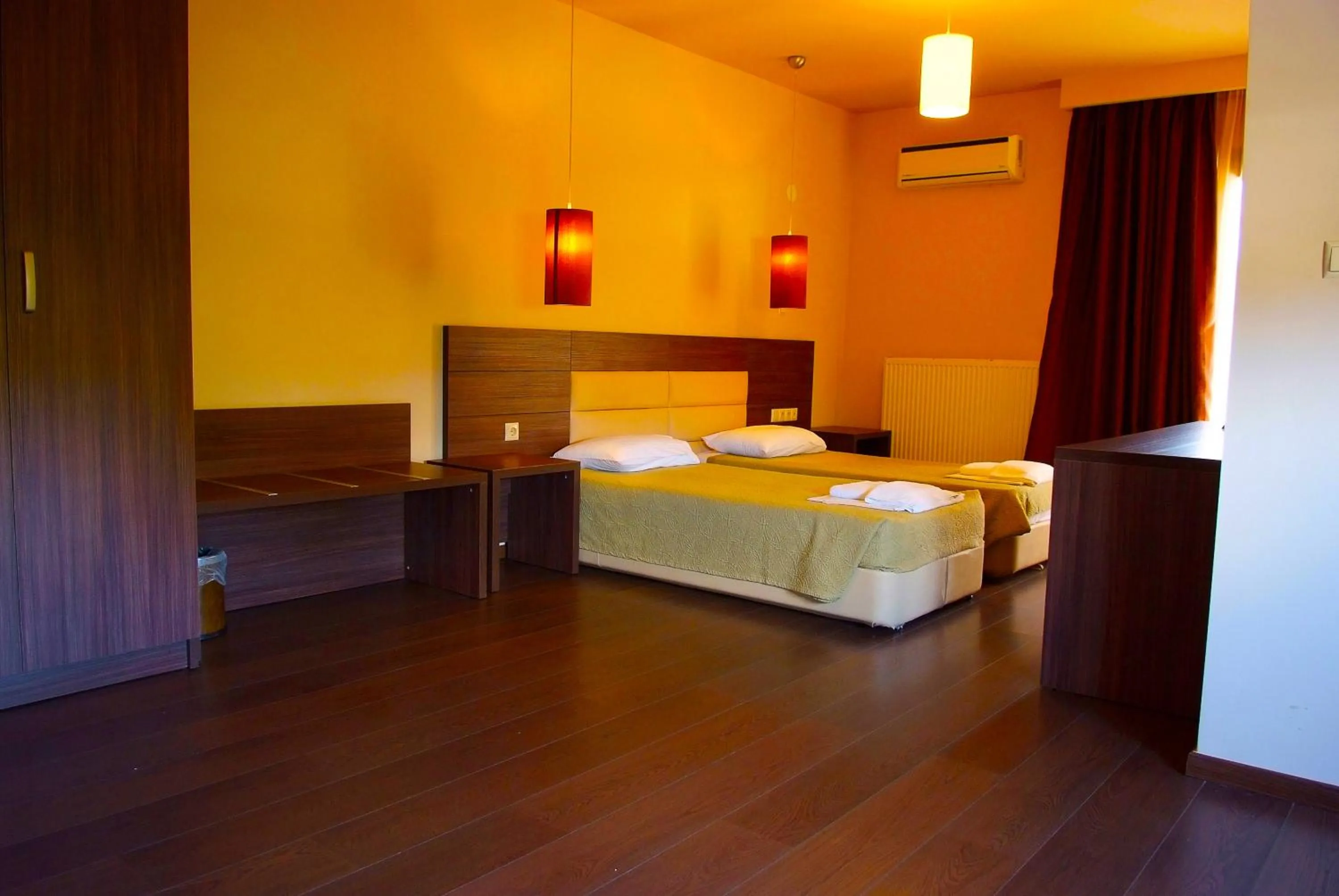 Bedroom in Plotini Hotel