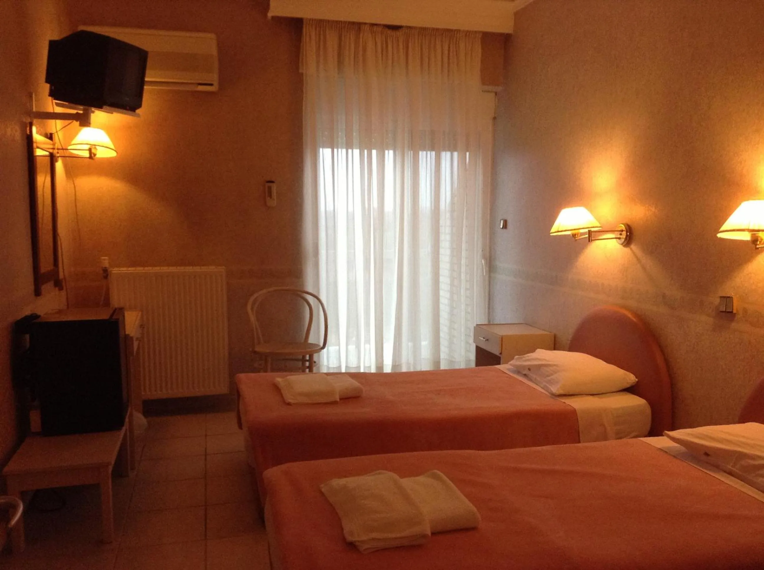 Bedroom in Plotini Hotel