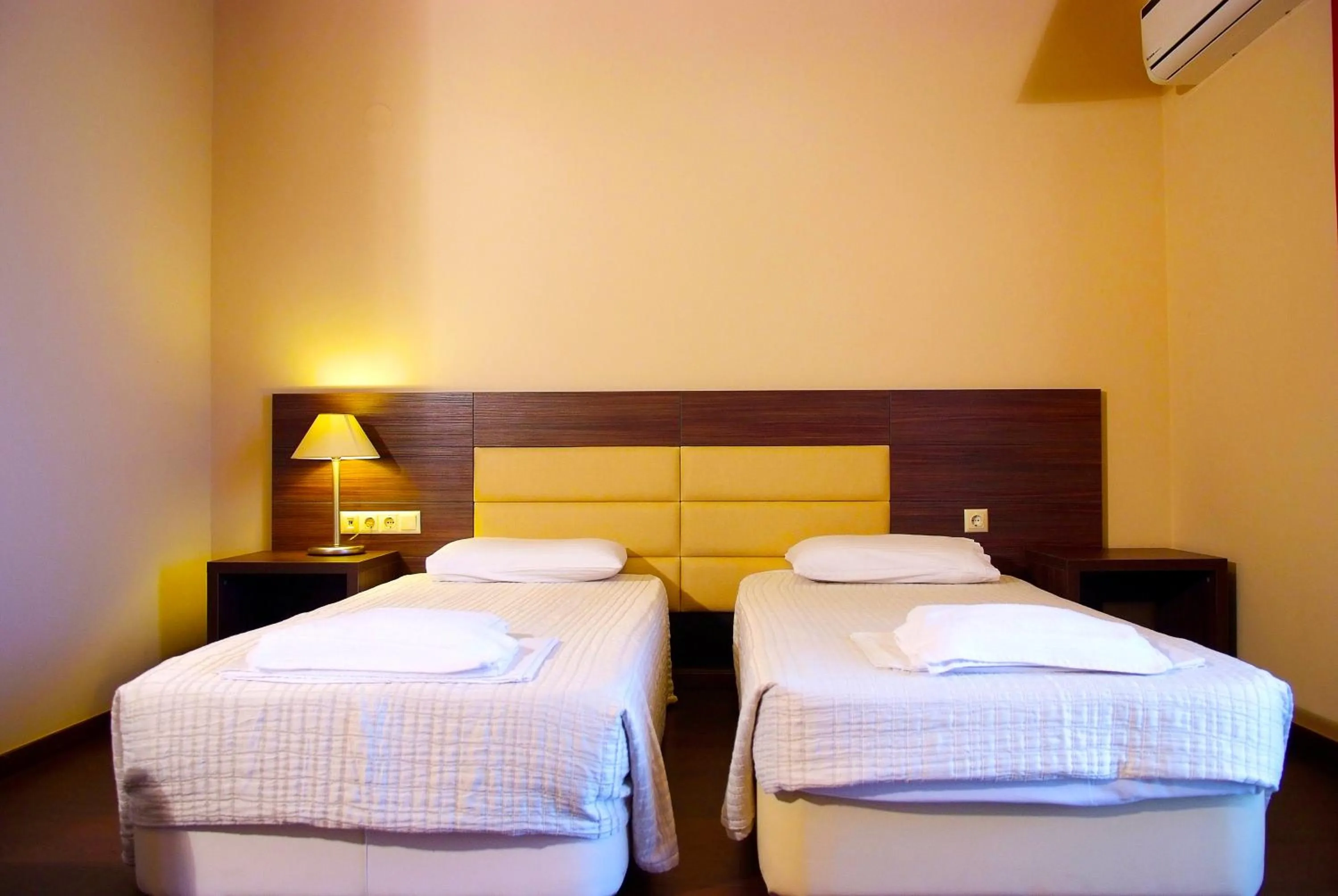 Bedroom in Plotini Hotel