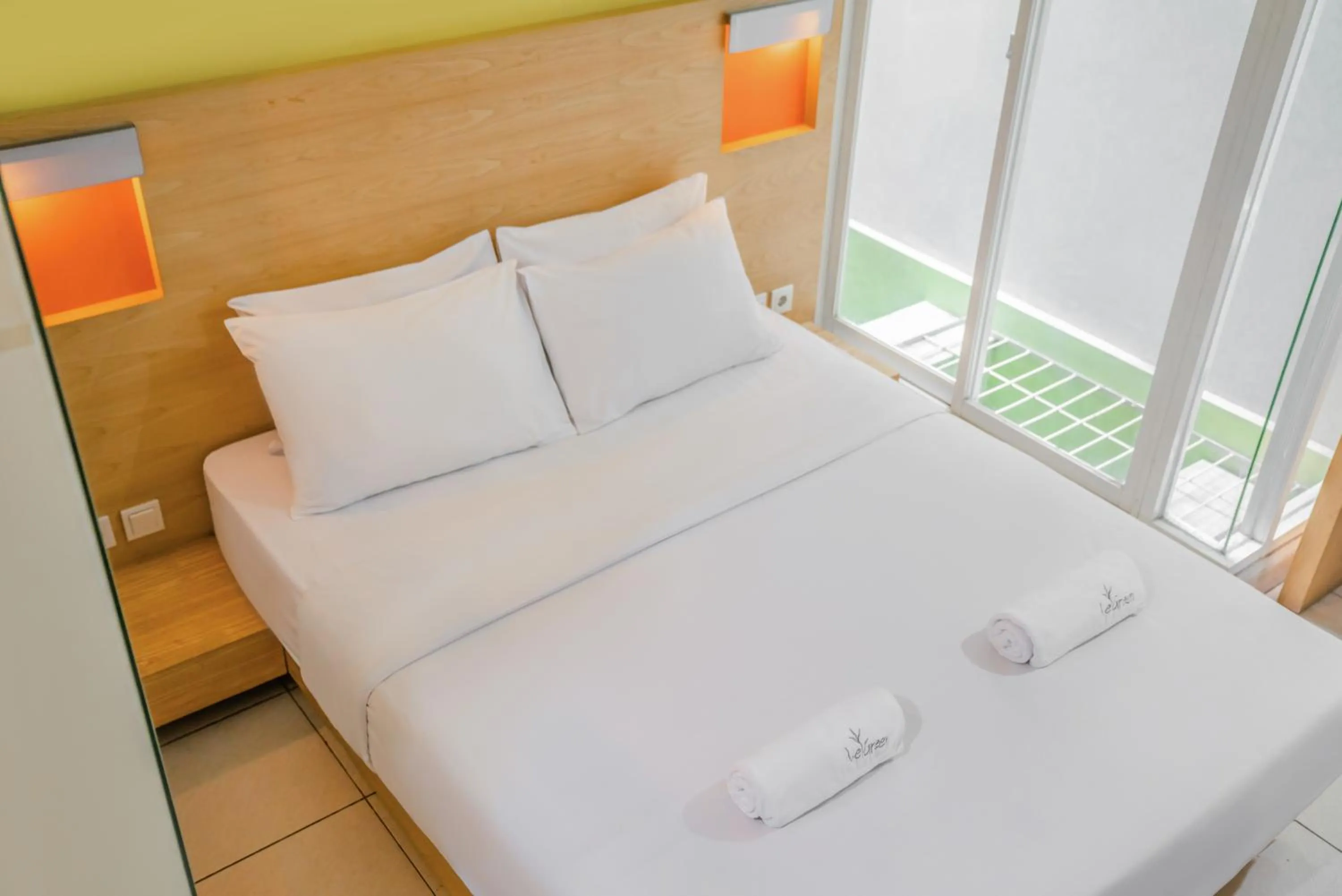 Bed in LeGreen Suite Poso