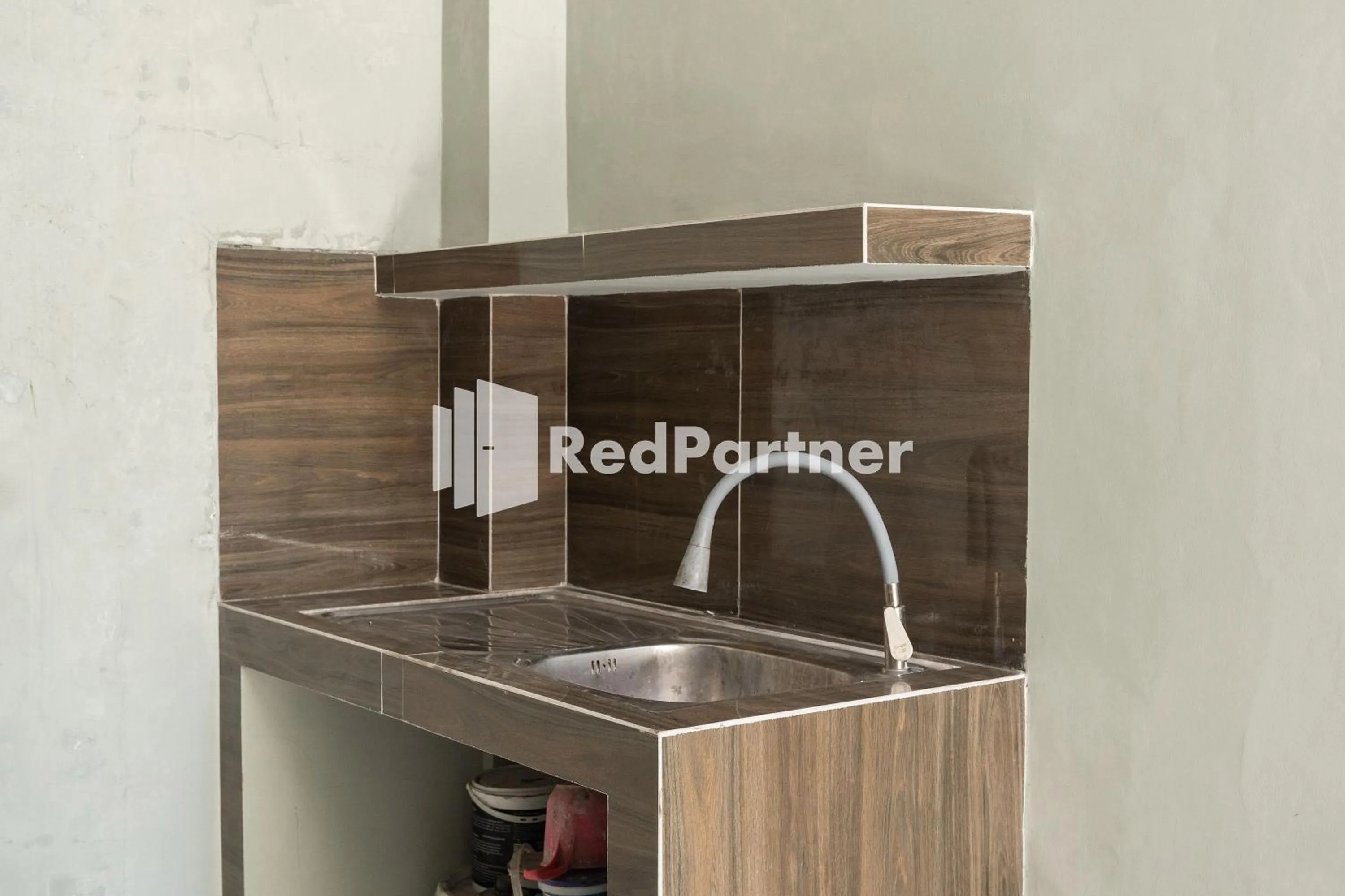 Kitchen or kitchenette in Athena House Syariah Near The Park Mall Solo Baru Mitra RedDoorz