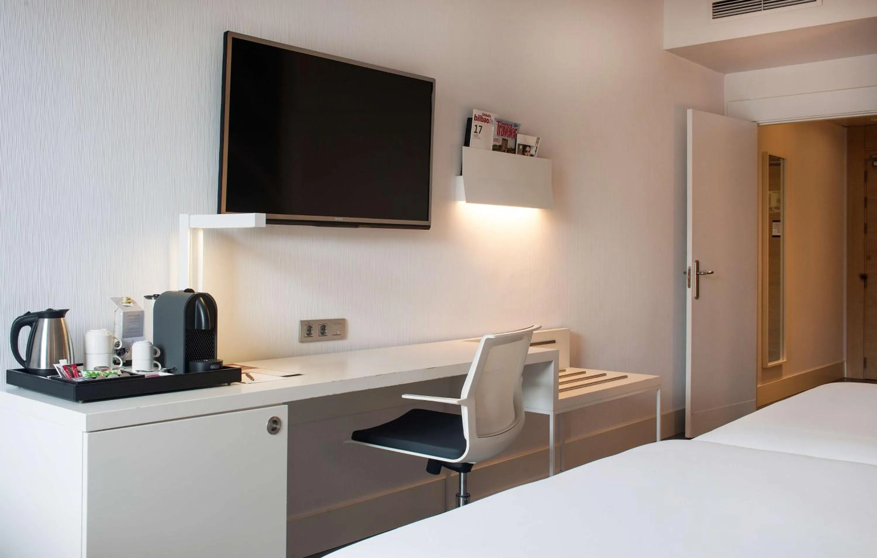 Photo of the whole room, Bed in NH Collection Villa de Bilbao