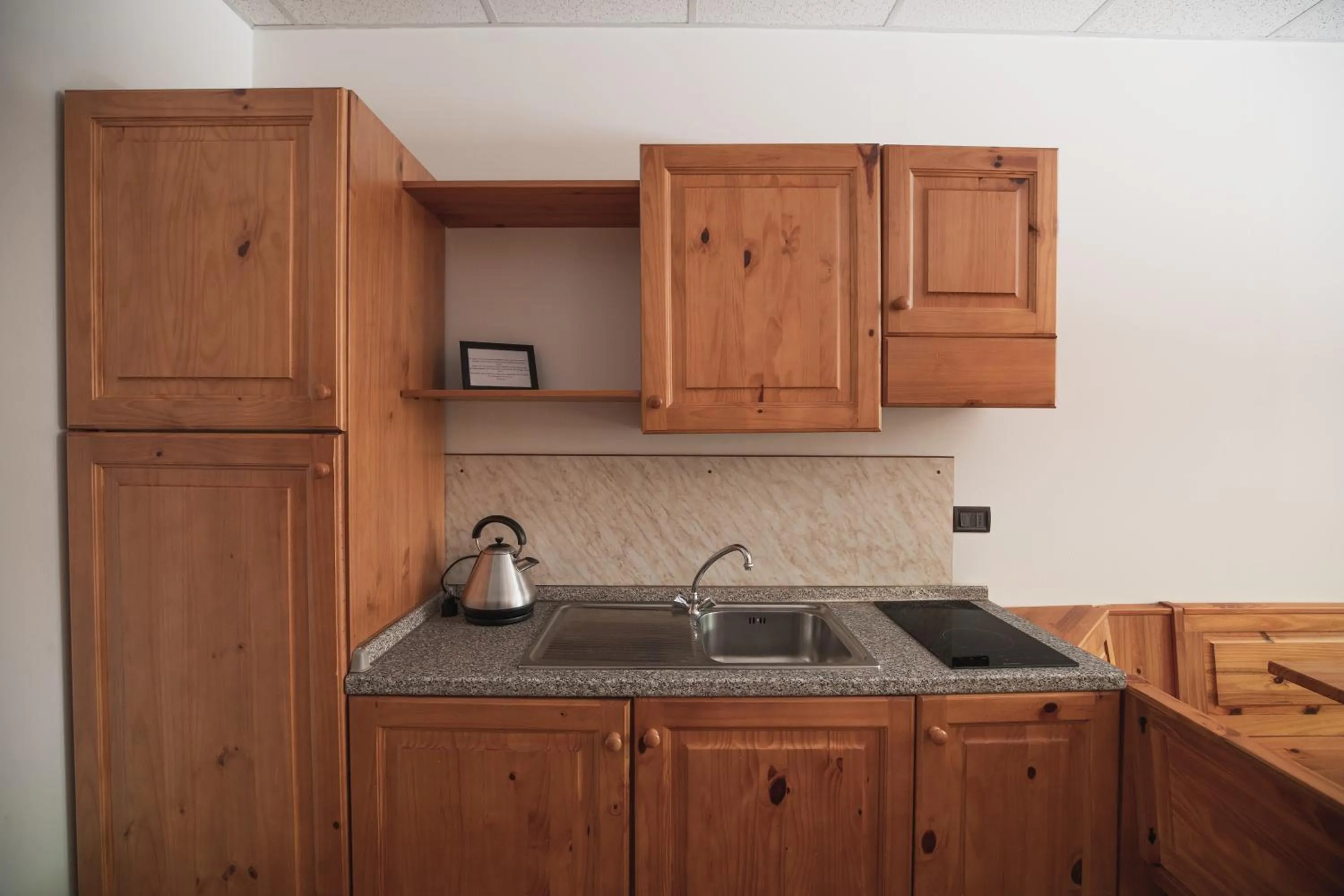 kitchen in PLOSE Parkhotel & Residence